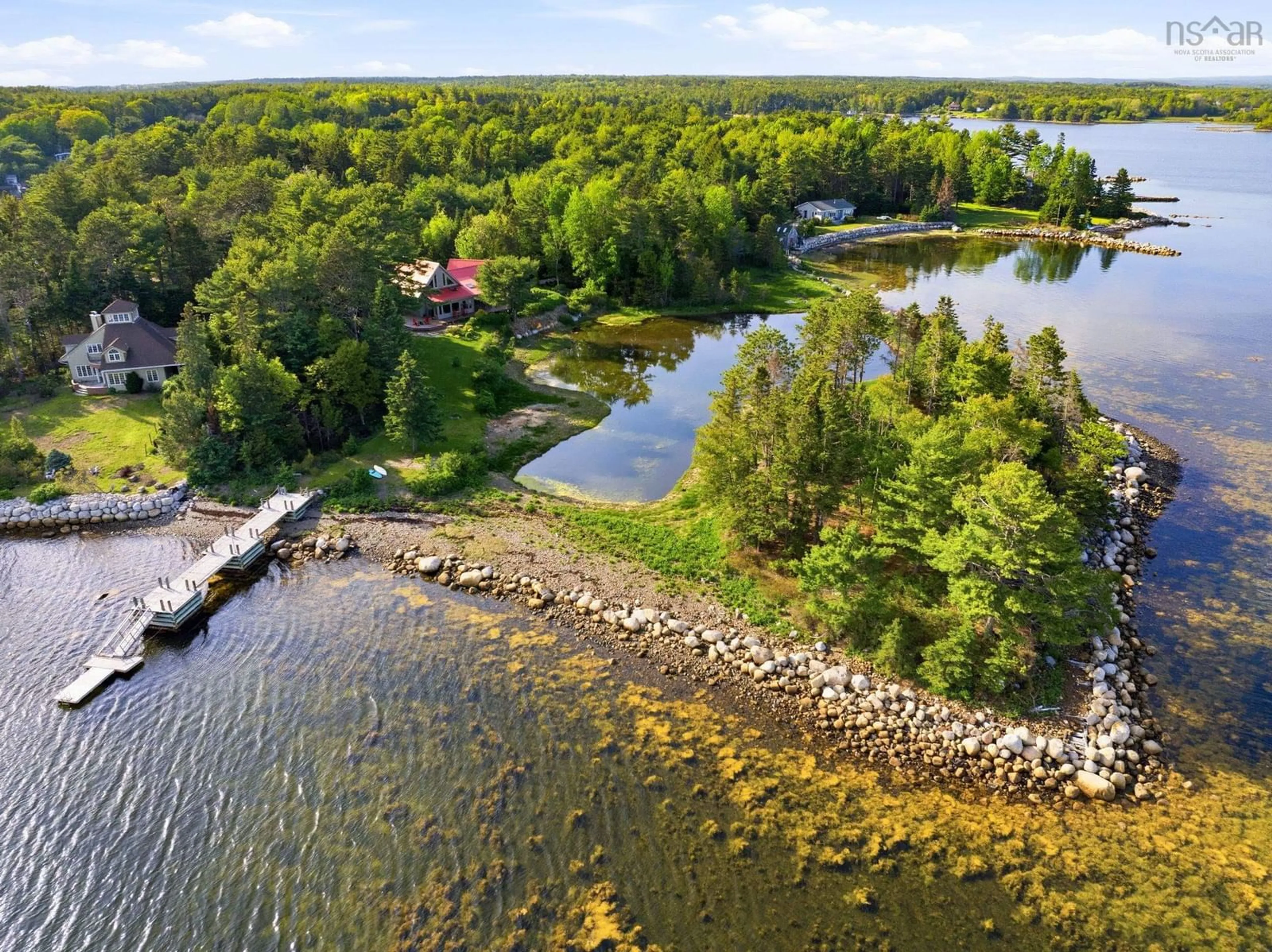 A pic from outside/outdoor area/front of a property/back of a property/a pic from drone, water/lake/river/ocean view for 22 Heron Point Rd, Martins River Nova Scotia B0J 2E0