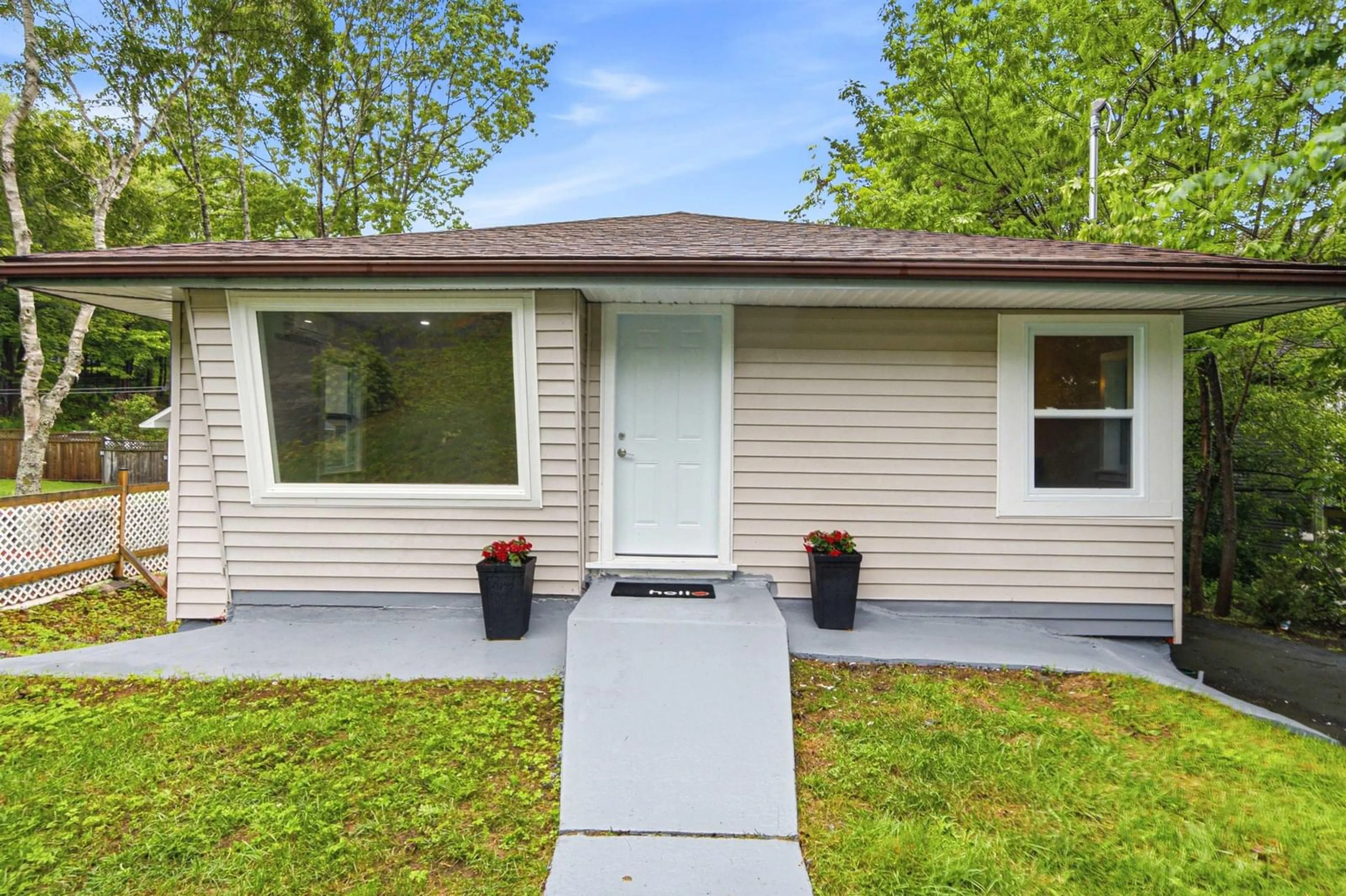 Home with vinyl exterior material, street for 12 Nelson Avenue, Halifax Nova Scotia B3P 1V8