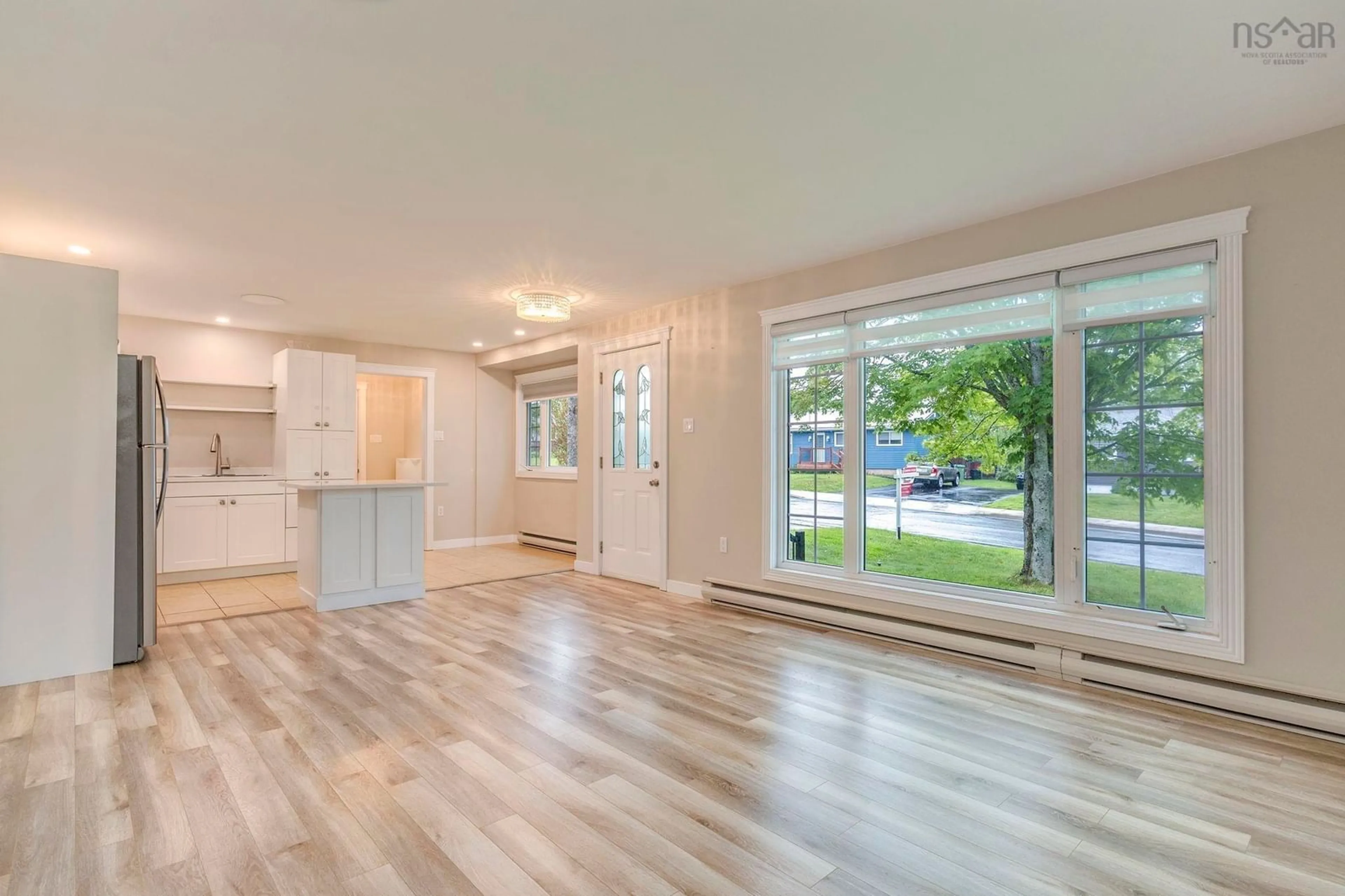 Open concept kitchen, wood/laminate floor for 208 Prince Street, Lower Sackville Nova Scotia B4C 1L5