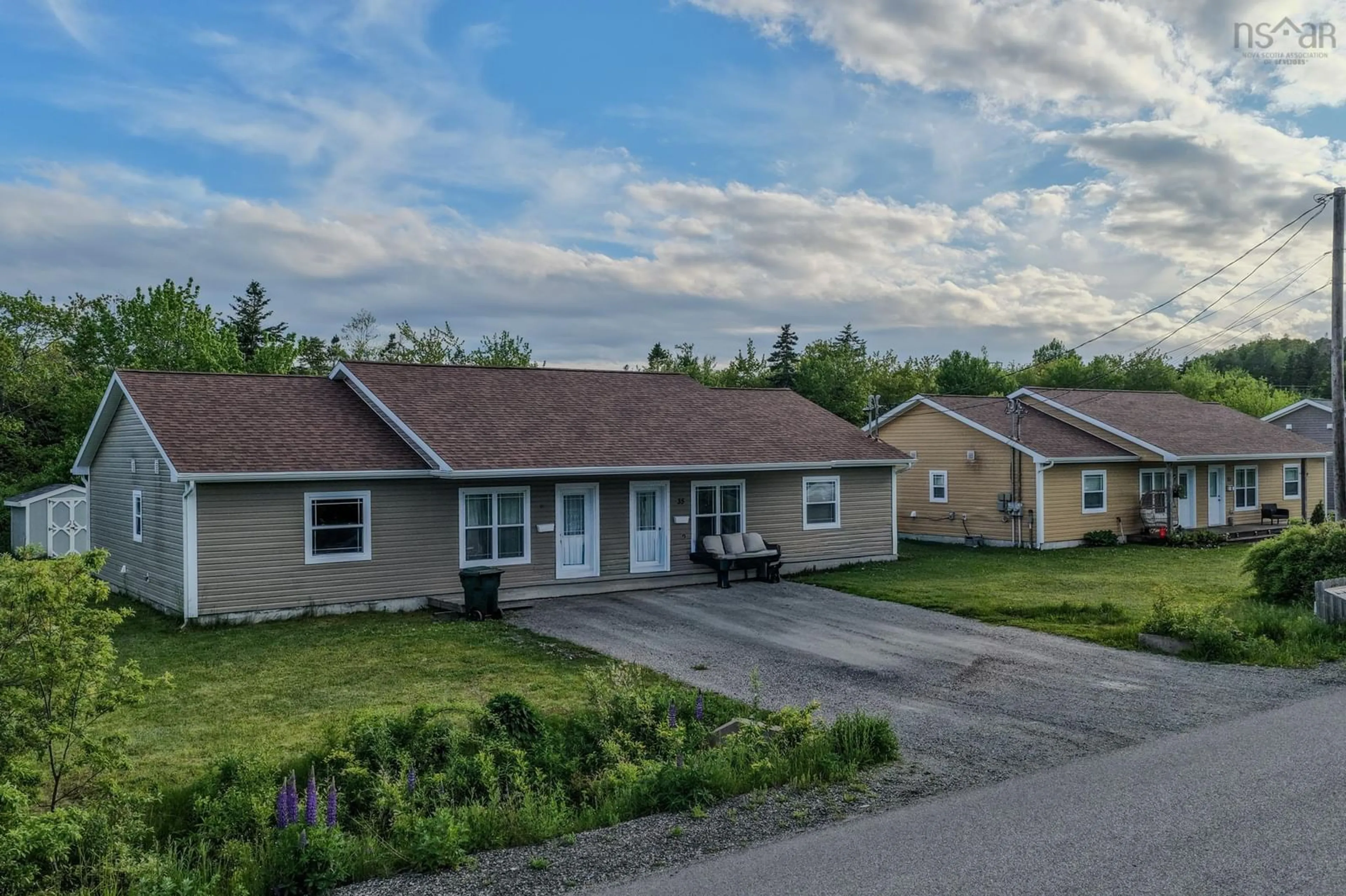 A pic from outside/outdoor area/front of a property/back of a property/a pic from drone, street for 33 Deerfield Dr, Coxheath Nova Scotia B1R 2K4