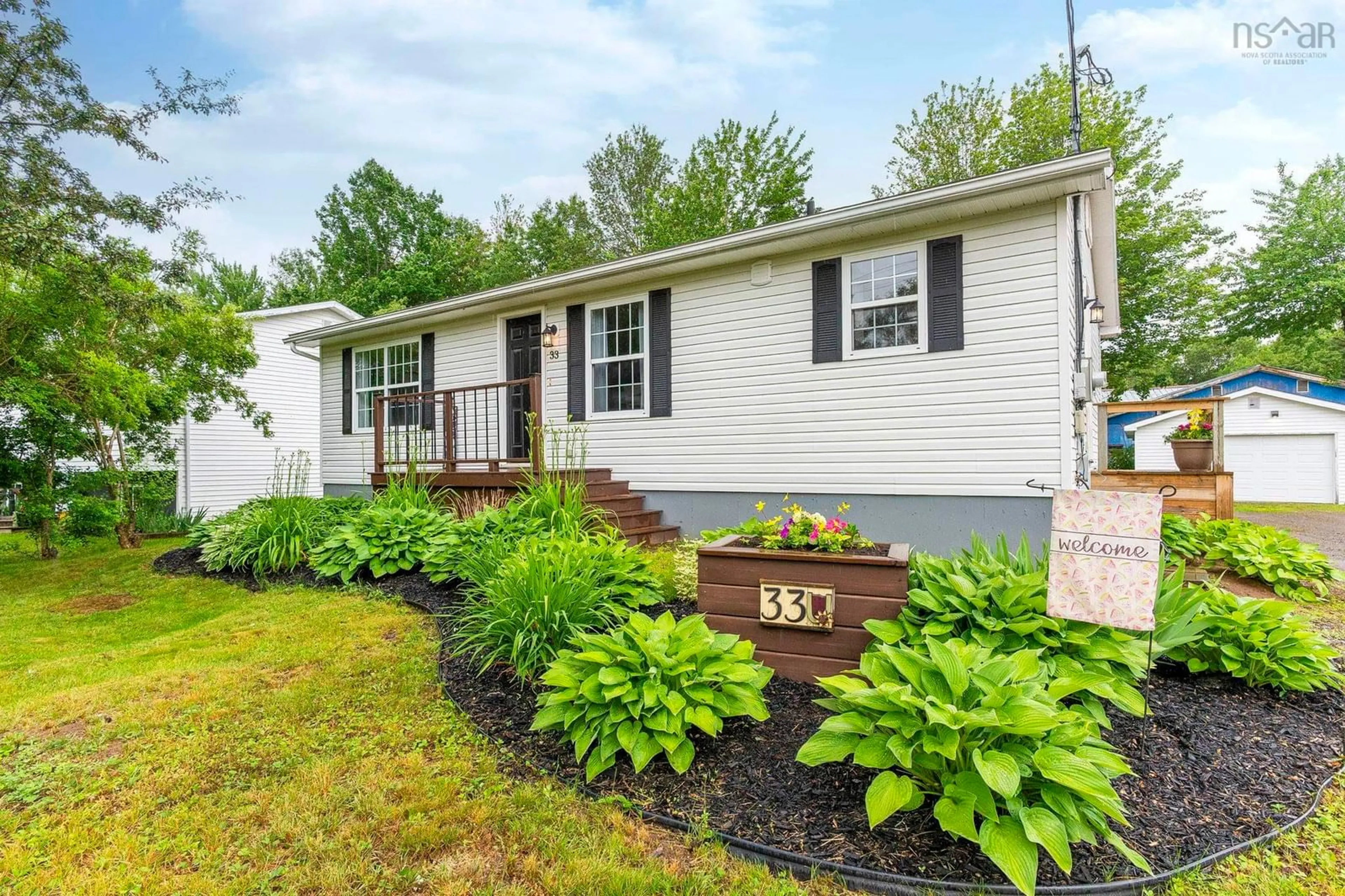 Home with vinyl exterior material, street for 33 Ladyslipper Dr, Centreville Nova Scotia B0P 1J0