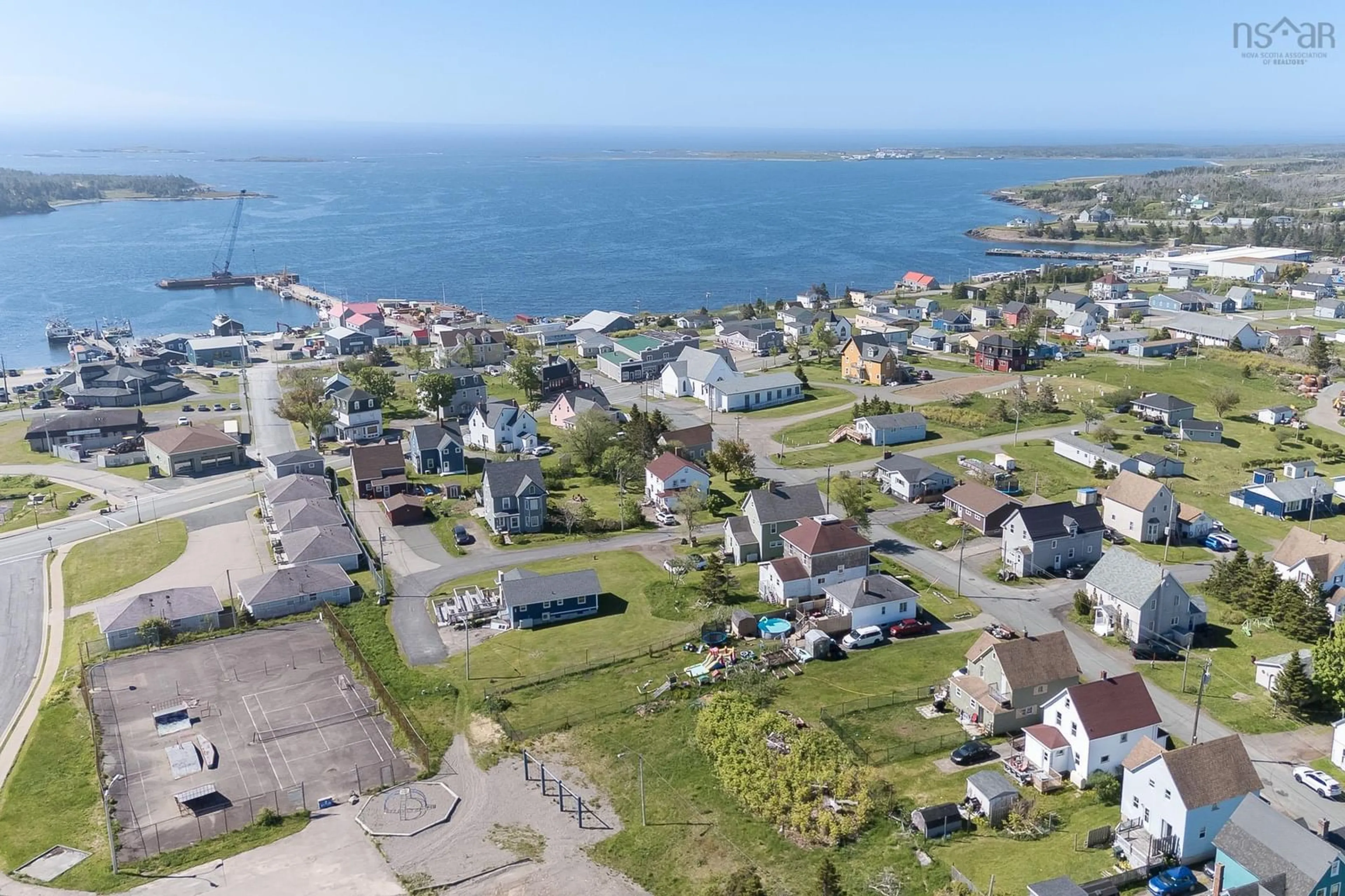 A pic from outside/outdoor area/front of a property/back of a property/a pic from drone, street for 23 Upper Warren St, Louisbourg Nova Scotia B1C 1M9