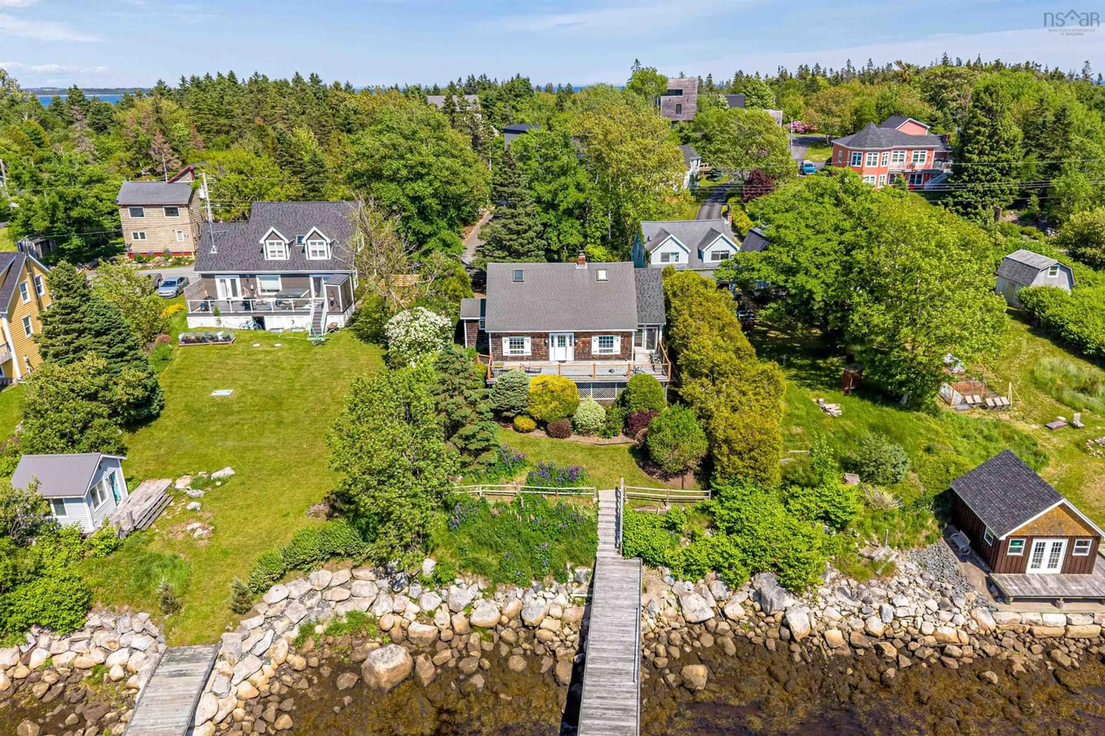 A pic from outside/outdoor area/front of a property/back of a property/a pic from drone, water/lake/river/ocean view for 65 Shore Rd, Herring Cove Nova Scotia B3V 1G7