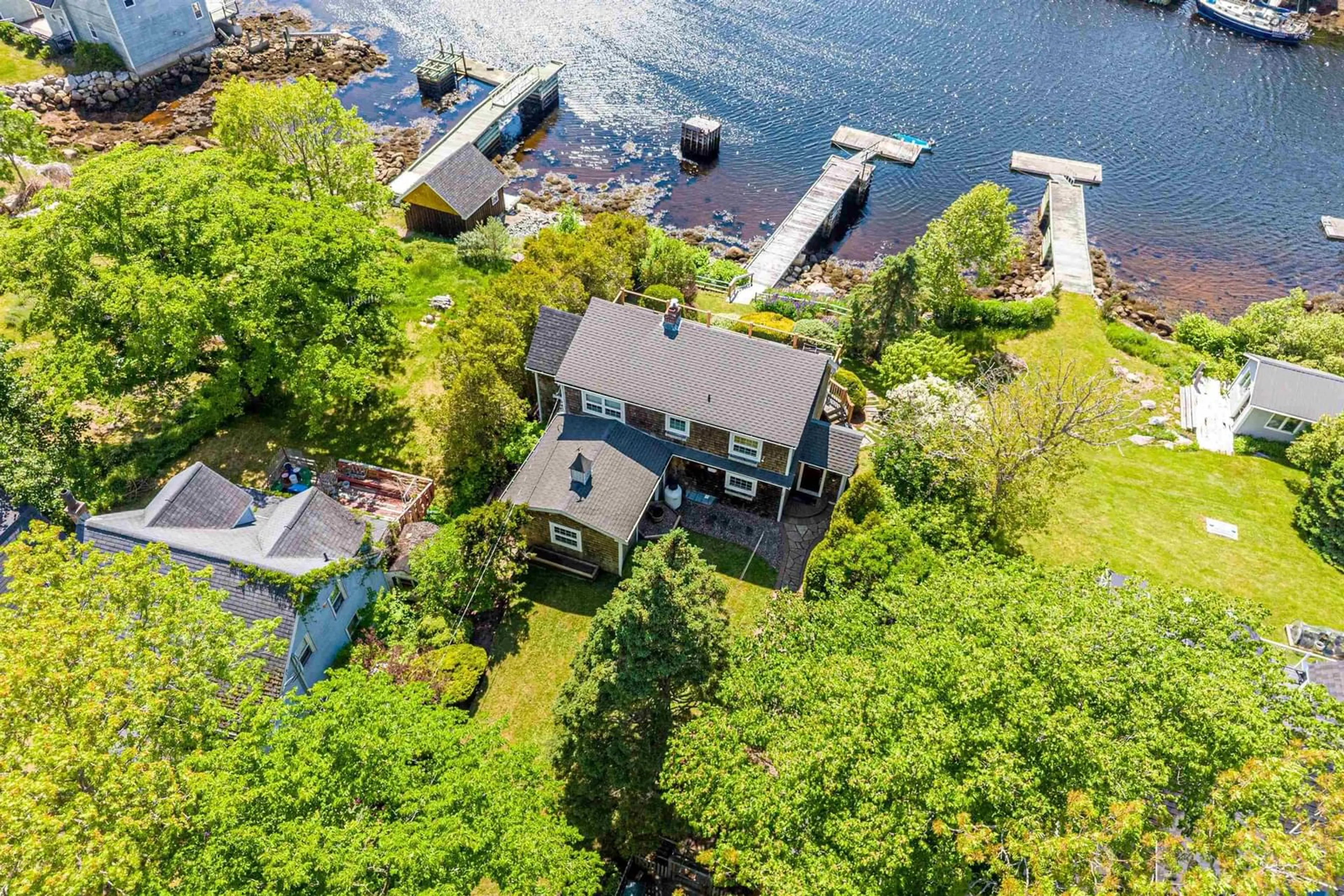 A pic from outside/outdoor area/front of a property/back of a property/a pic from drone, water/lake/river/ocean view for 65 Shore Rd, Herring Cove Nova Scotia B3V 1G7
