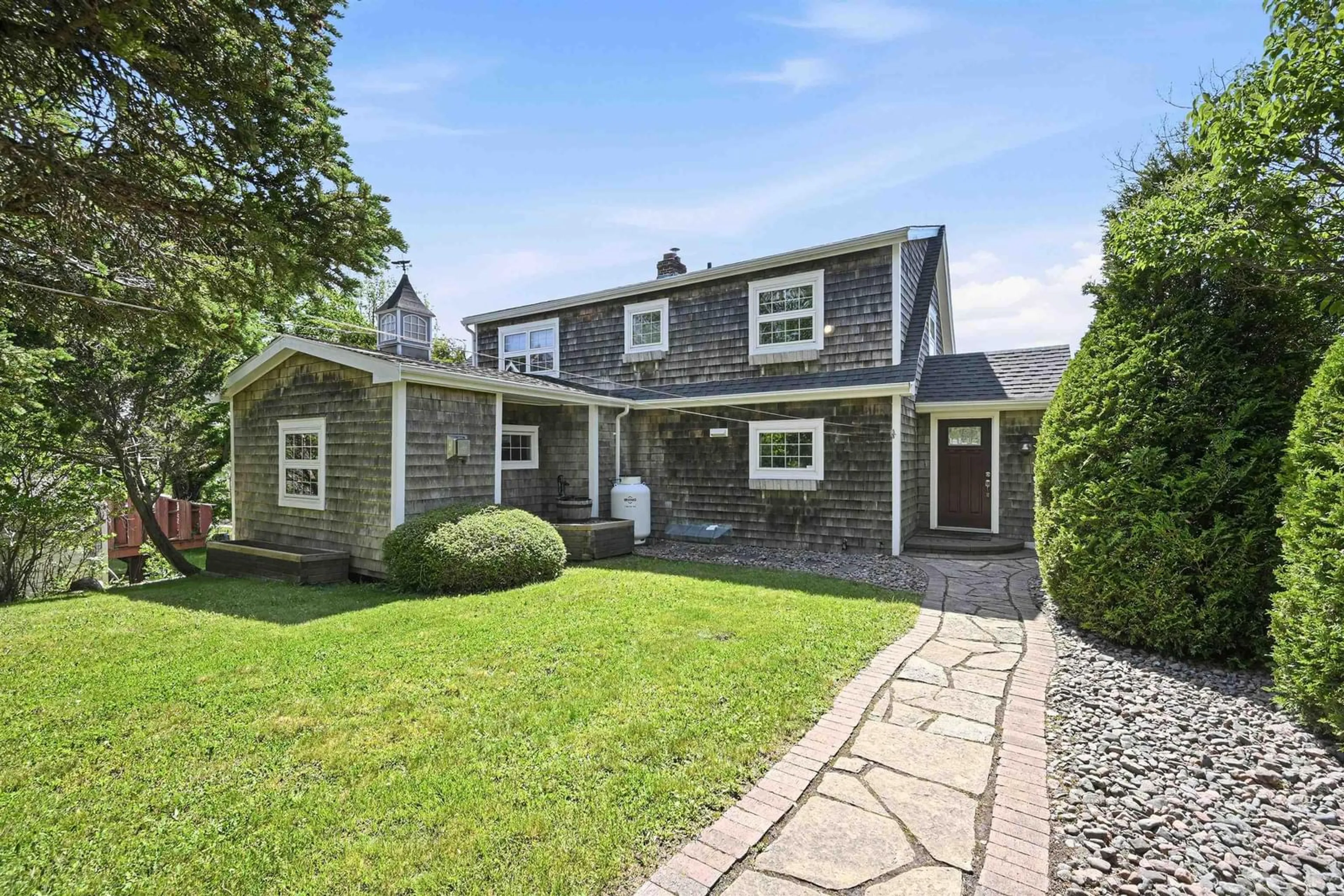 A pic from outside/outdoor area/front of a property/back of a property/a pic from drone, street for 65 Shore Rd, Herring Cove Nova Scotia B3V 1G7