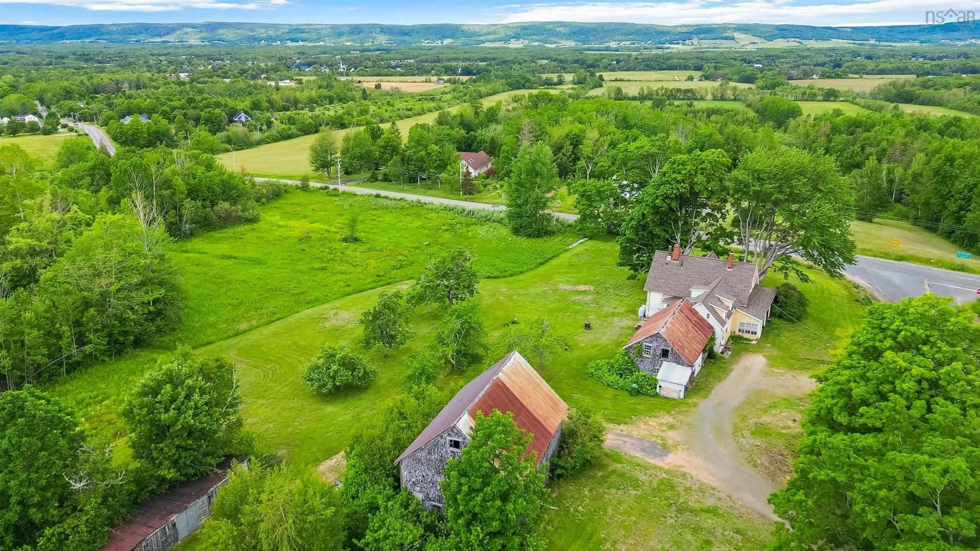 A pic from outside/outdoor area/front of a property/back of a property/a pic from drone, mountain view for 1709 Crisp Rd, South Williamston Nova Scotia B0S 1M0