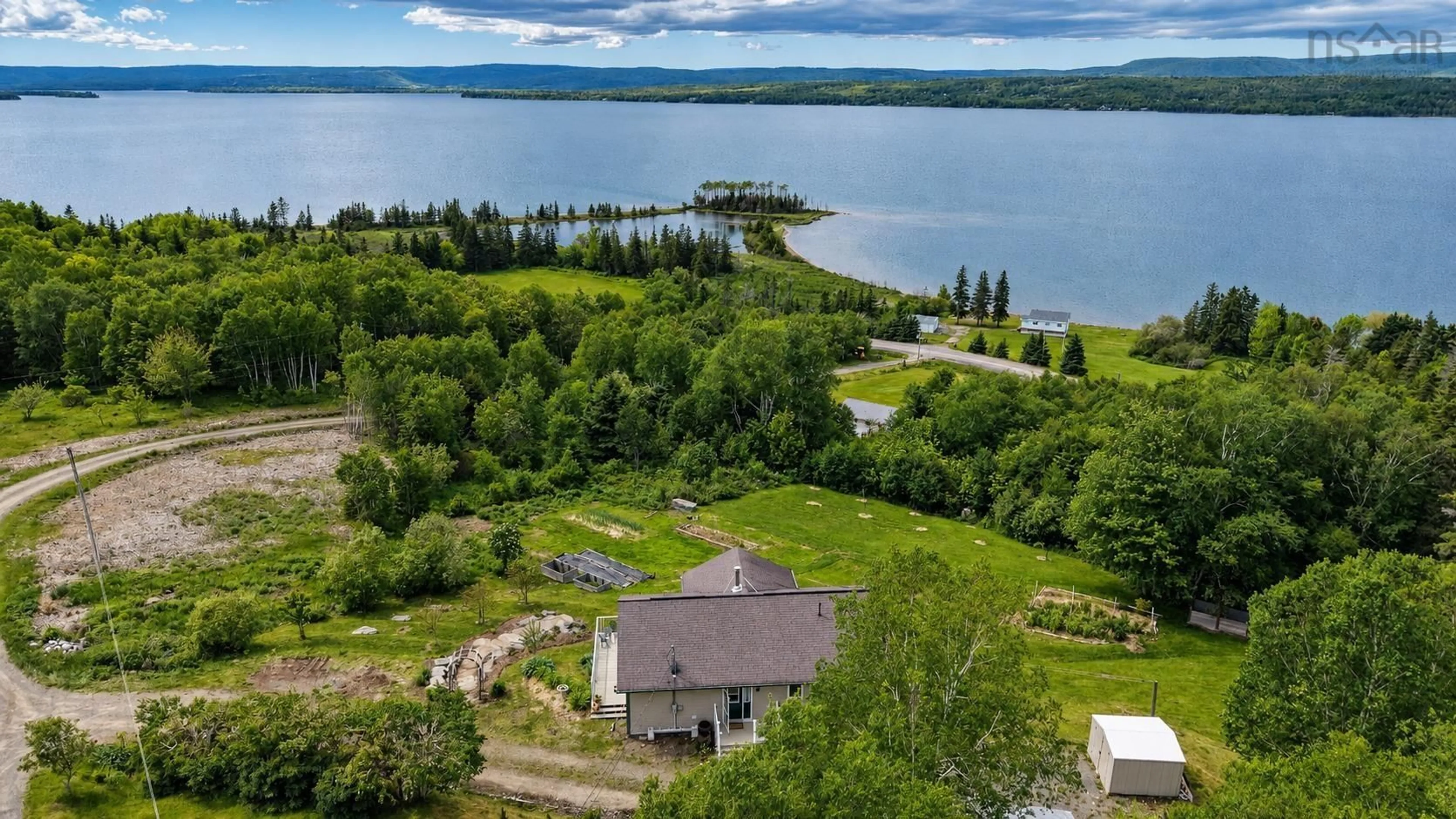 A pic from outside/outdoor area/front of a property/back of a property/a pic from drone, water/lake/river/ocean view for 95 Birchill Lane, Lower Washabuck Nova Scotia B2C 1P4