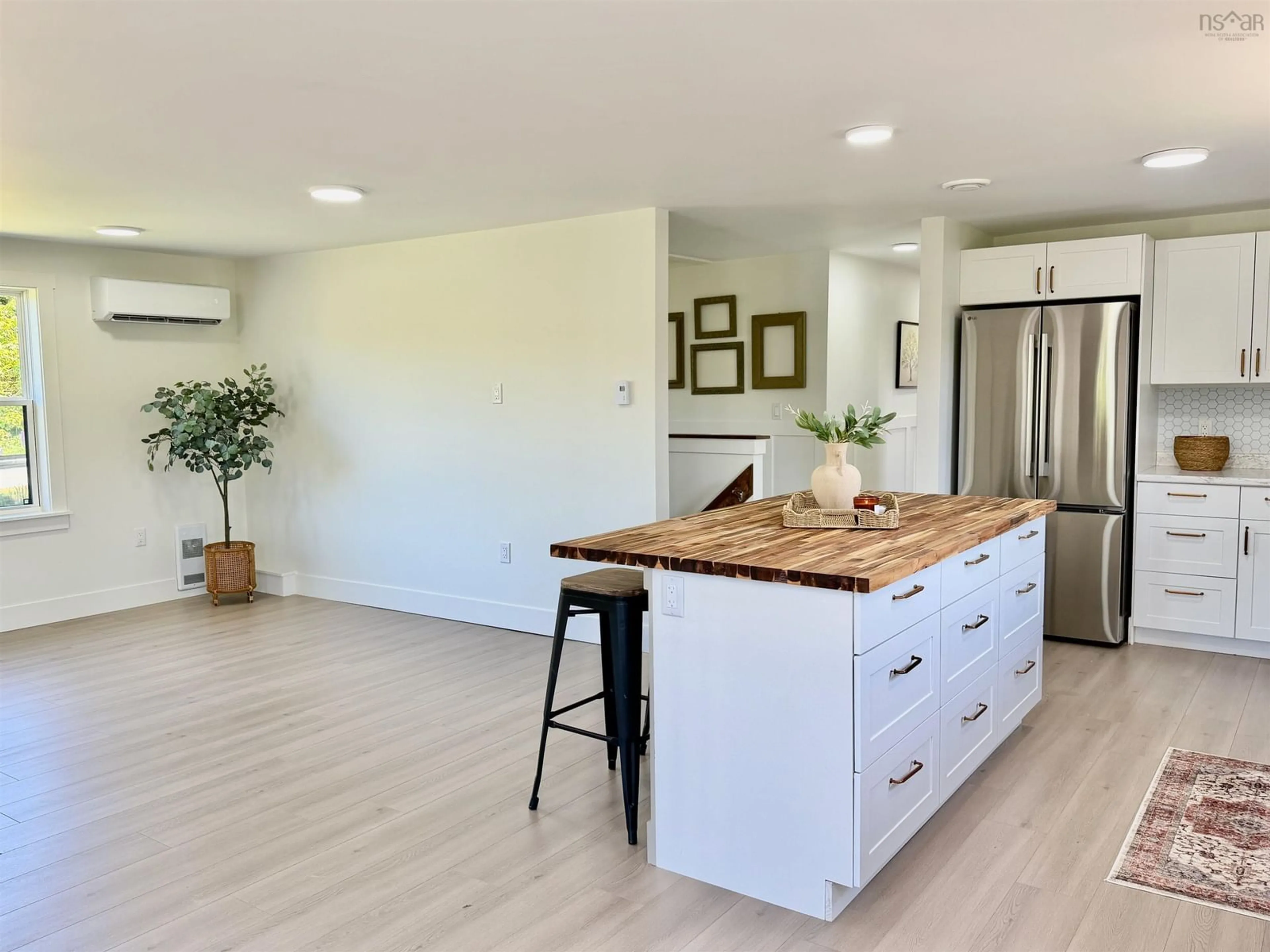 Open concept kitchen, wood/laminate floor for 220 Tinkham Rd, Brooklyn Nova Scotia B5A 4A7