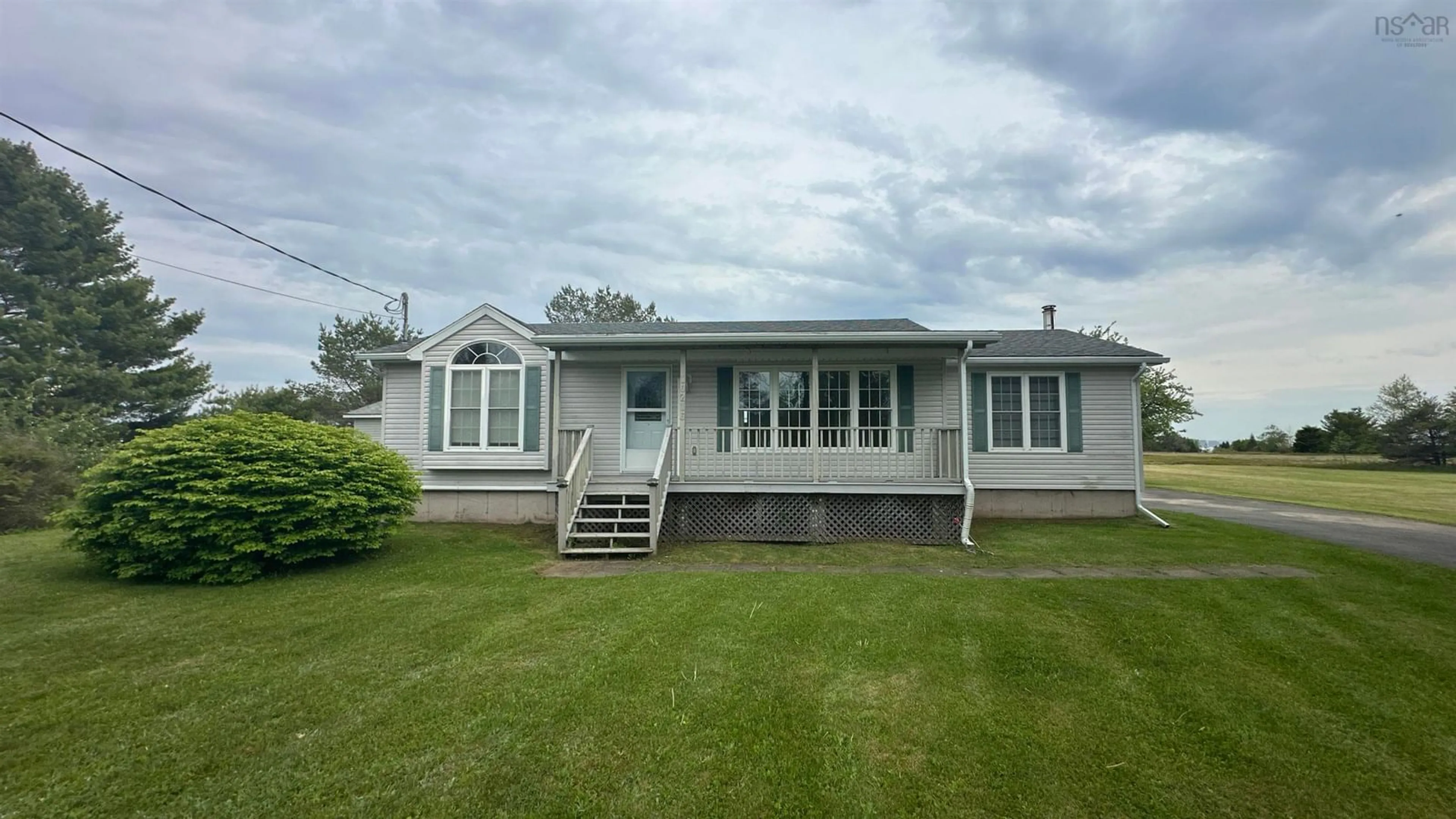 Home with vinyl exterior material, street for 10216 209 Hwy, Diligent River Nova Scotia B0M 1S0