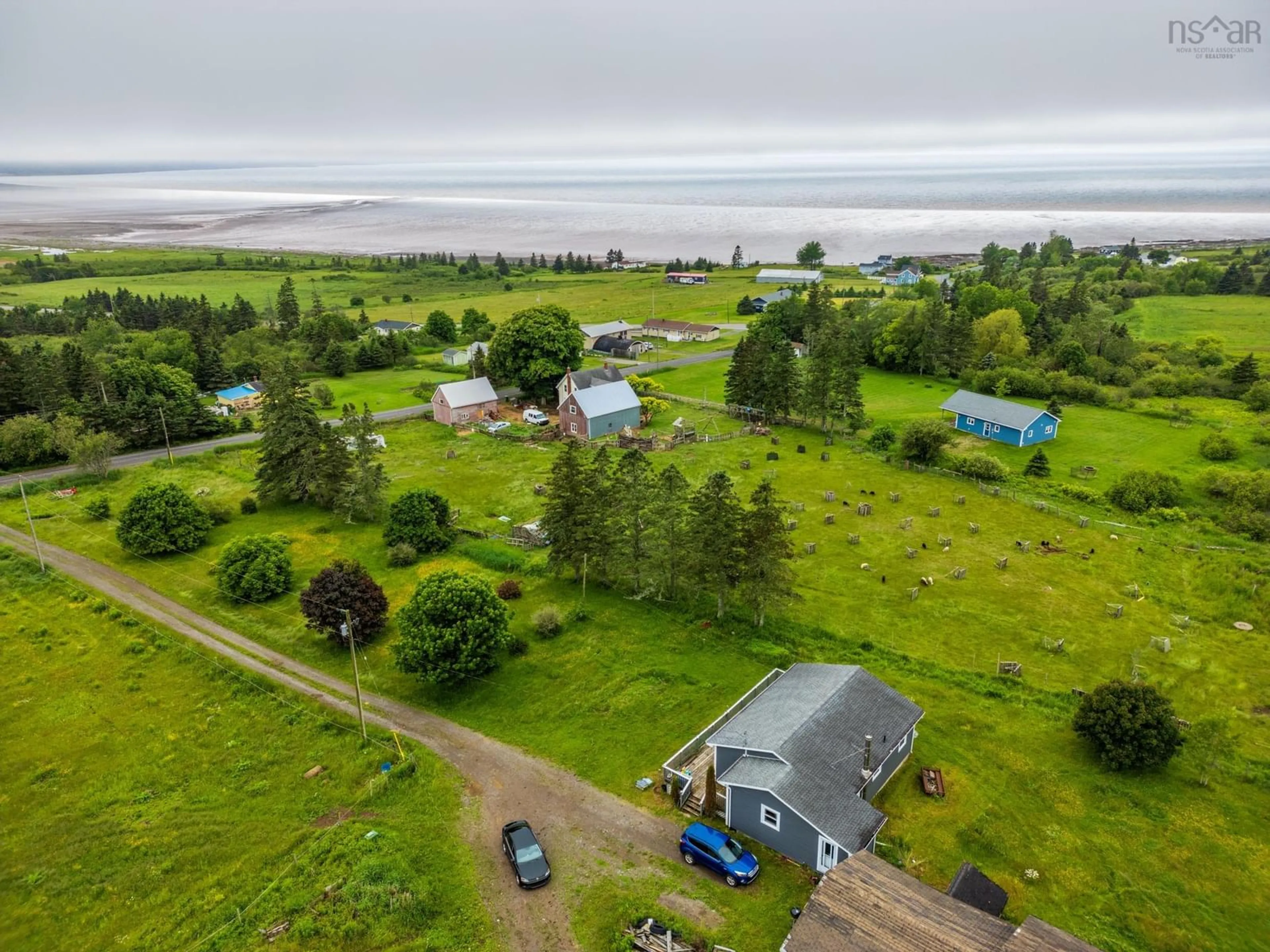 A pic from outside/outdoor area/front of a property/back of a property/a pic from drone, water/lake/river/ocean view for 39 Rogers Rd, Scots Bay Nova Scotia B0P 1H0