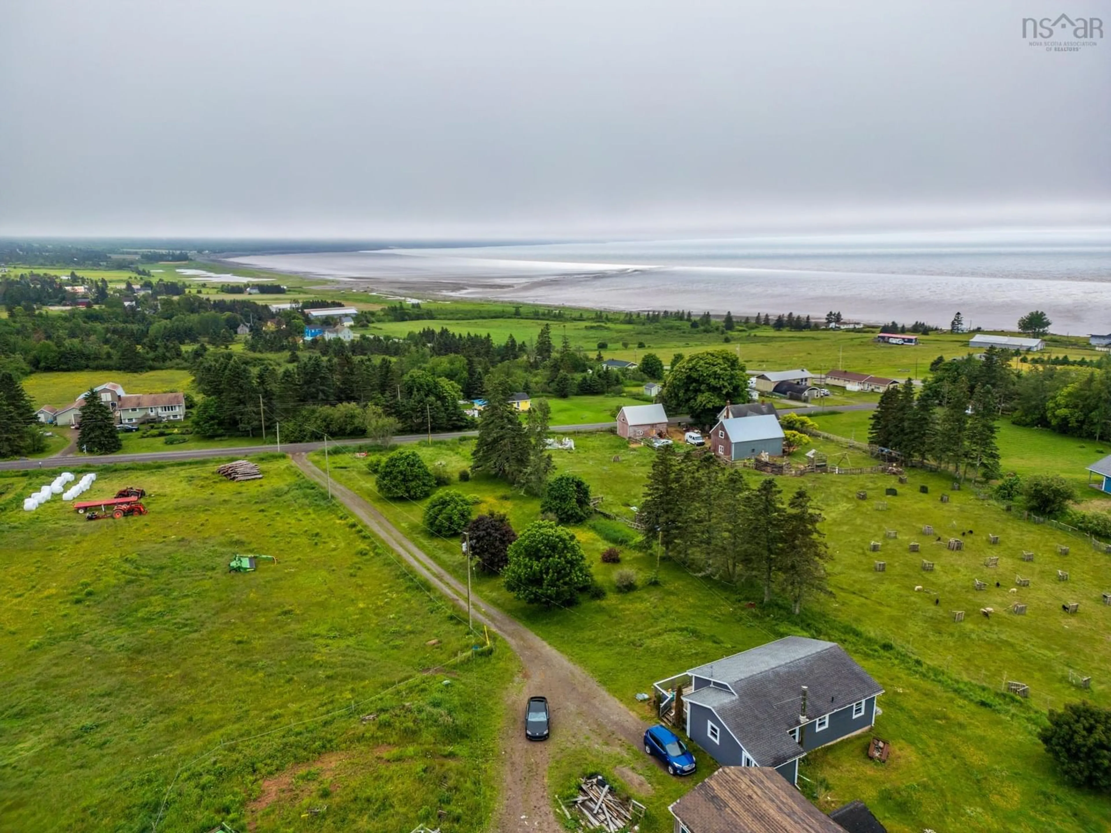 A pic from outside/outdoor area/front of a property/back of a property/a pic from drone, water/lake/river/ocean view for 39 Rogers Rd, Scots Bay Nova Scotia B0P 1H0