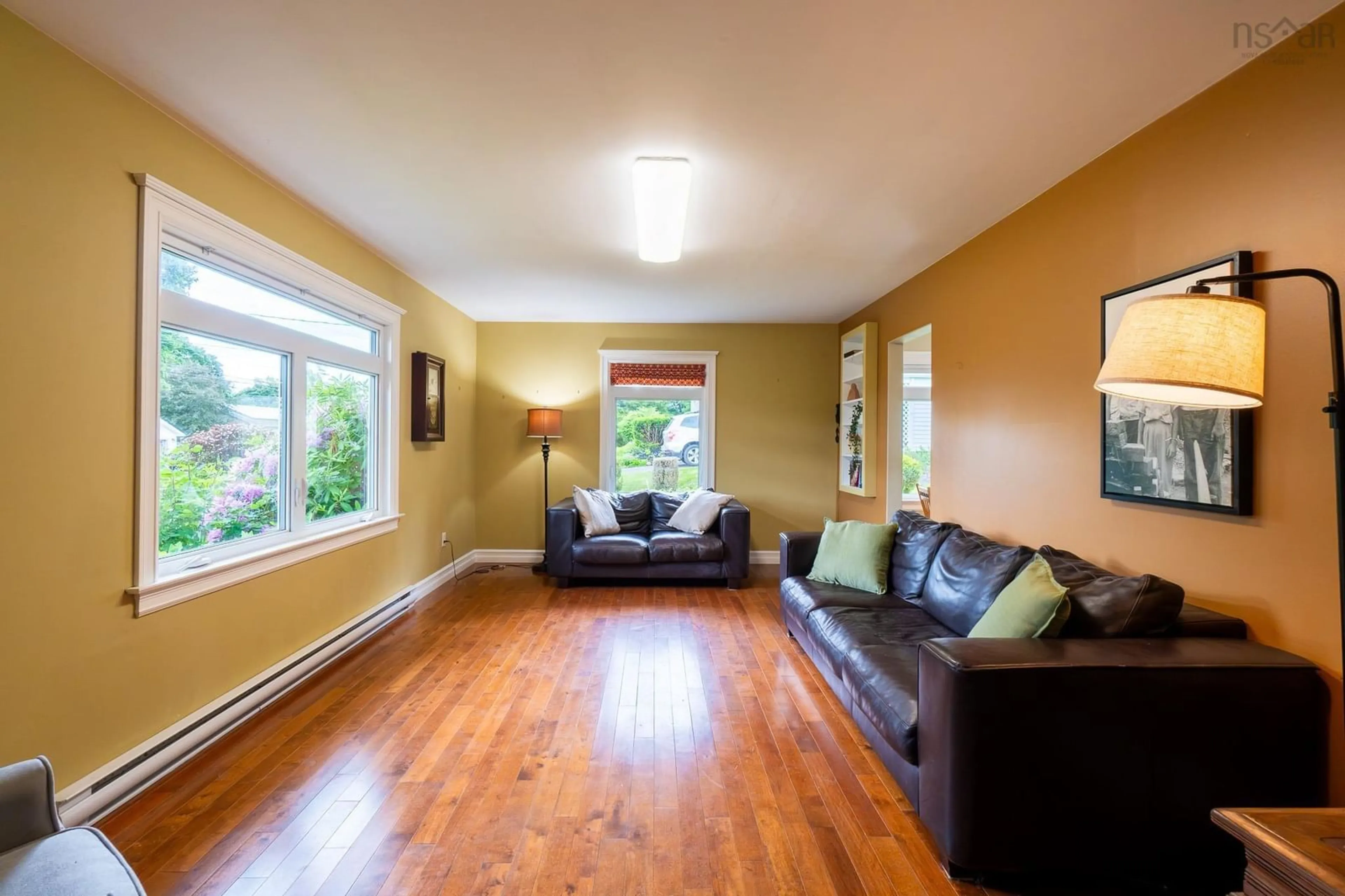 Living room with furniture, wood/laminate floor for 26 Lavinia St, Kentville Nova Scotia B4N 1V7