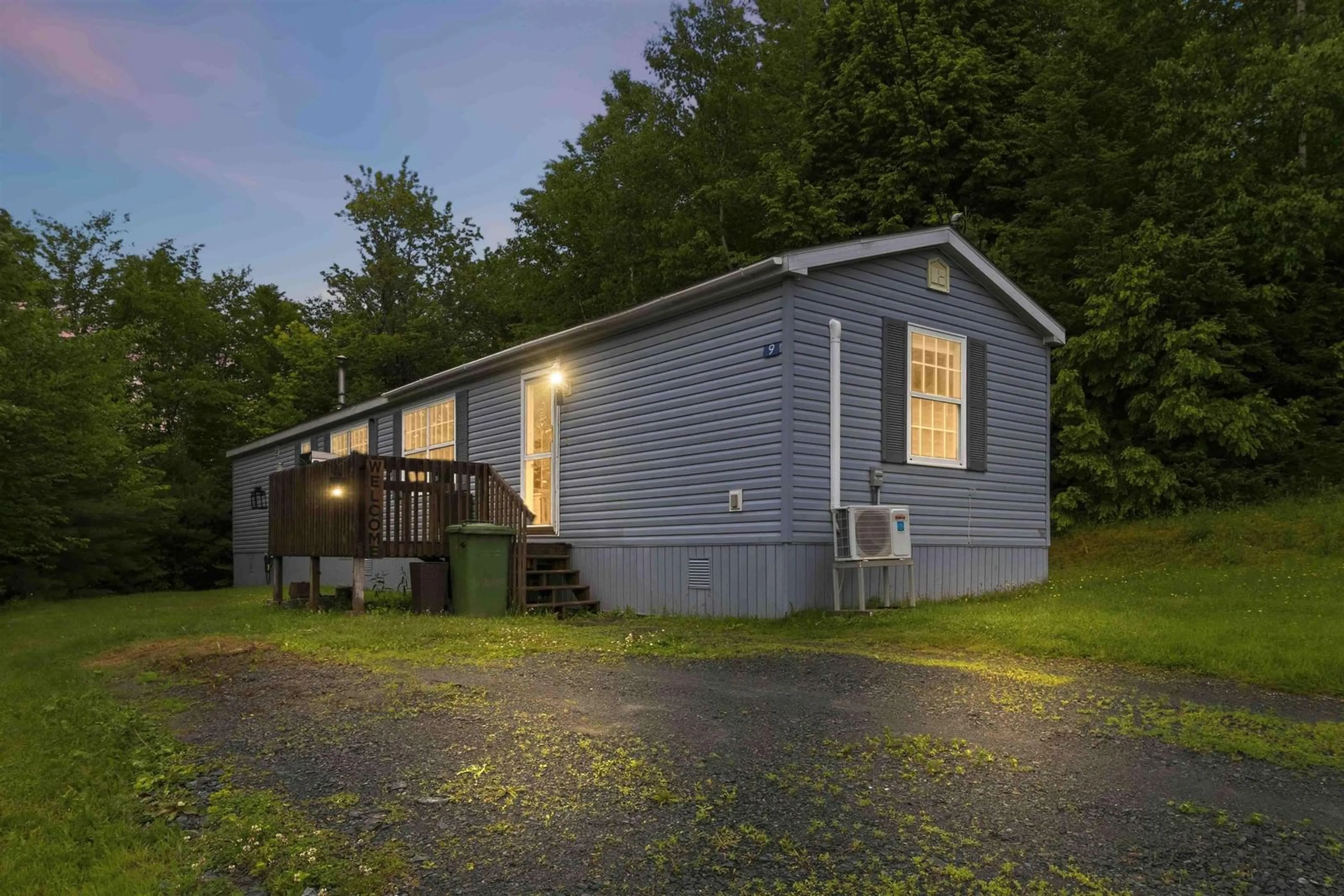 Home with vinyl exterior material, street for 9 Grumpy Lane, Lake Echo Nova Scotia B3E 1C4