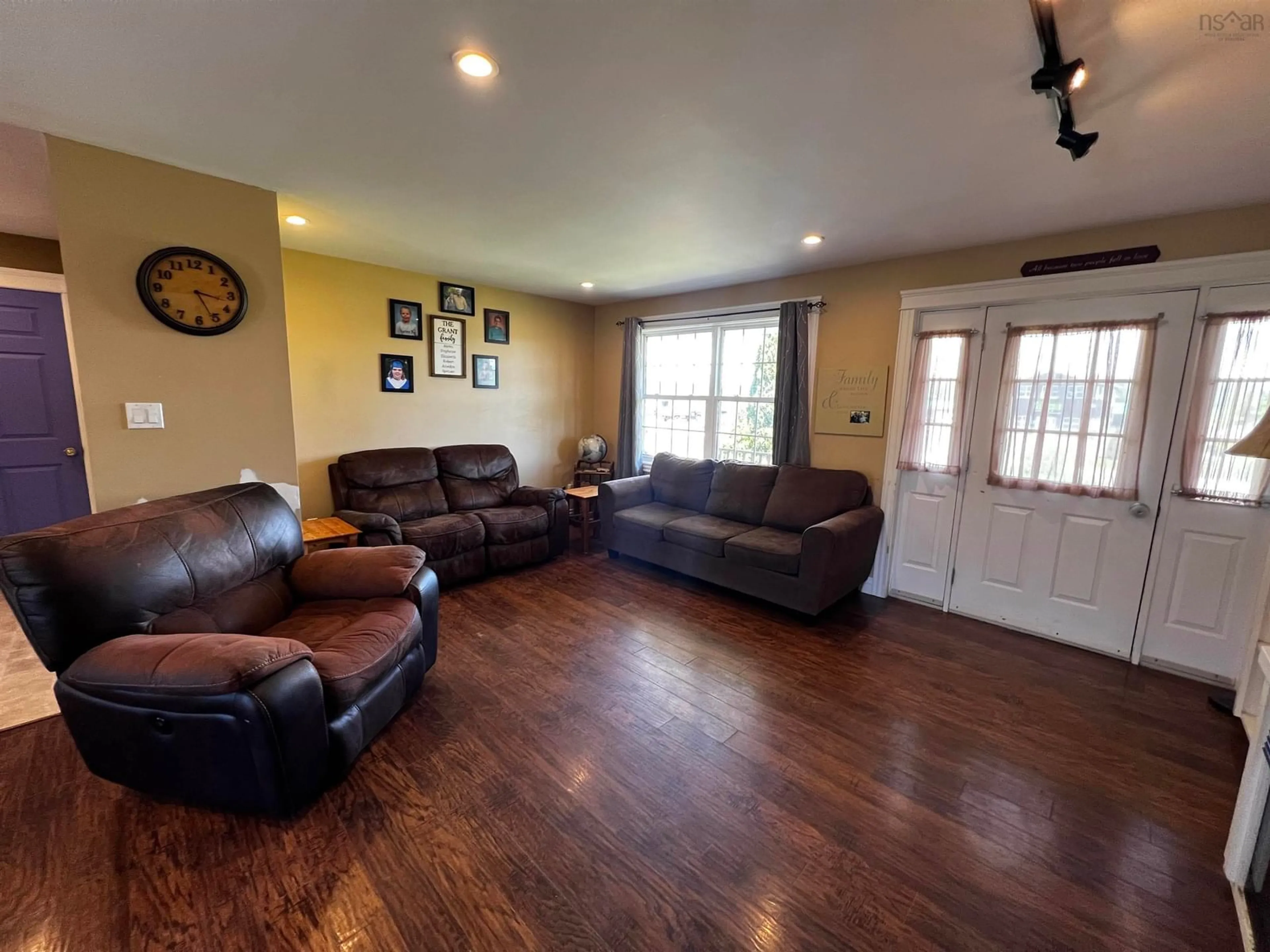 Living room with furniture, wood/laminate floor for 23 Deboer Dr Dr, Lawrencetown Nova Scotia B0S 1M0