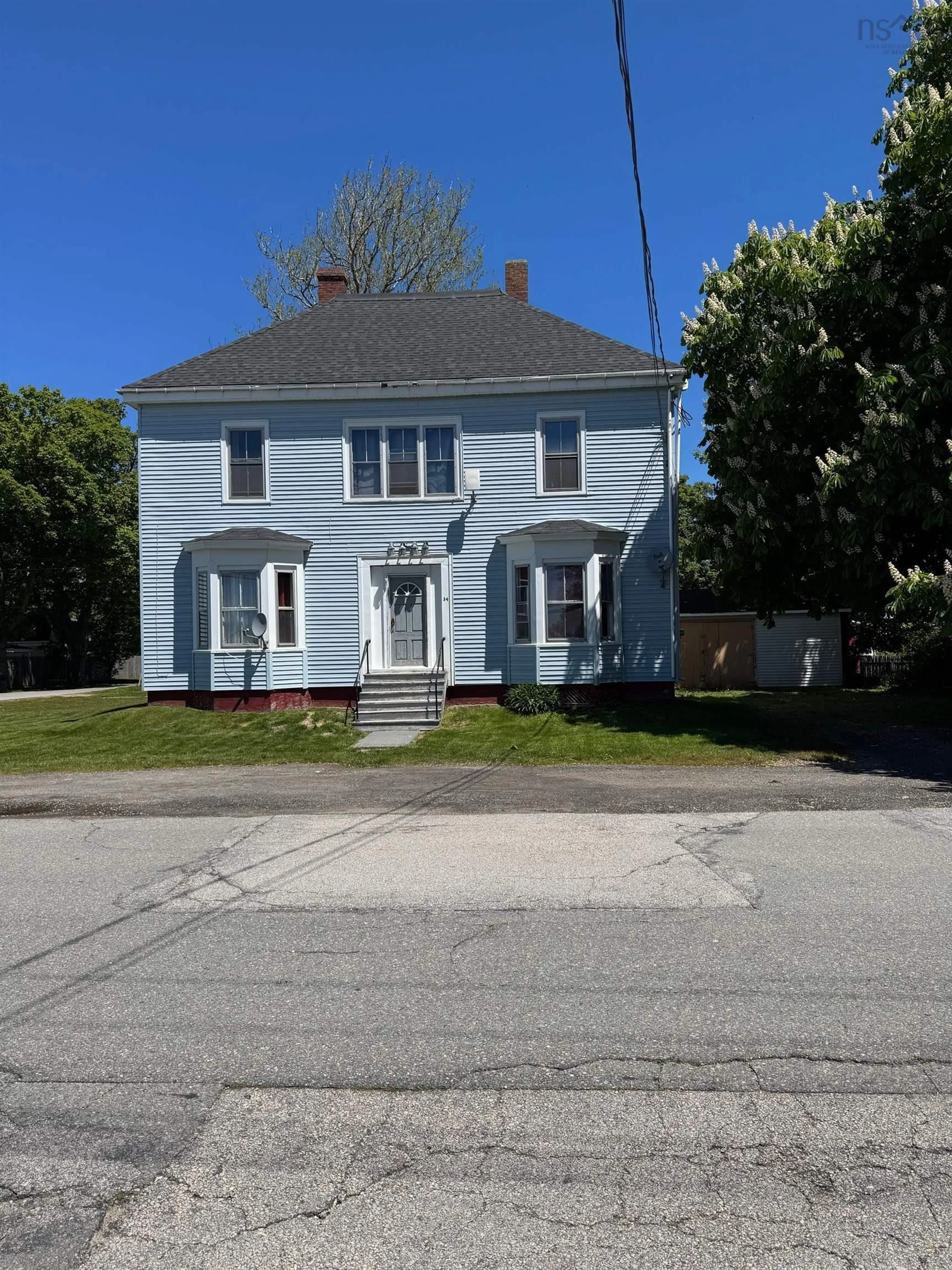 A pic from outside/outdoor area/front of a property/back of a property/a pic from drone, street for 34 Albert St, Yarmouth Nova Scotia B5A 3N3