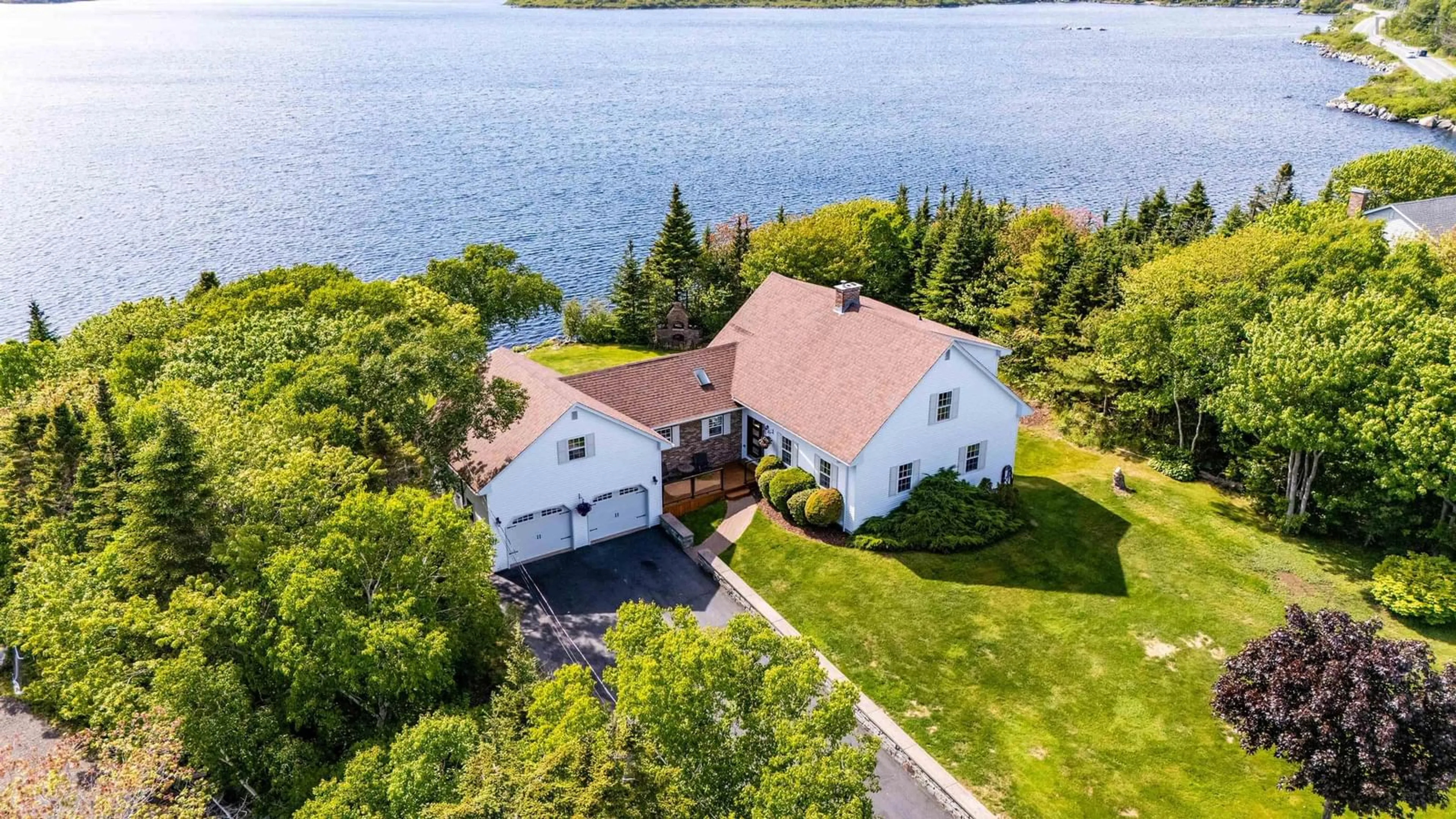 A pic from outside/outdoor area/front of a property/back of a property/a pic from drone, water/lake/river/ocean view for 63 Viewpoint Lane, Williamswood Nova Scotia B3V 1E7