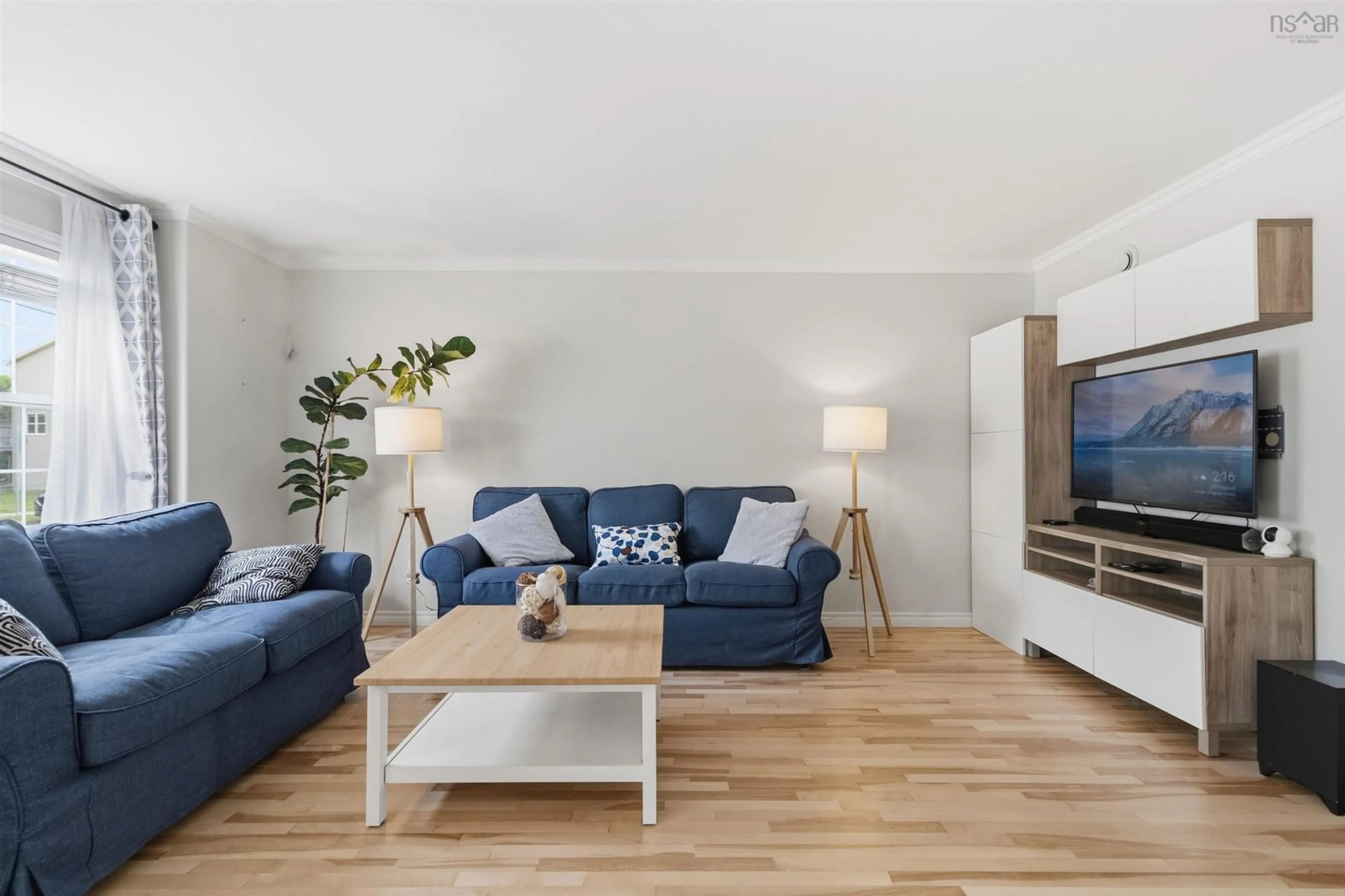 Living room with furniture, wood/laminate floor for 202 Transom Dr, Halifax Nova Scotia B3M 4T7