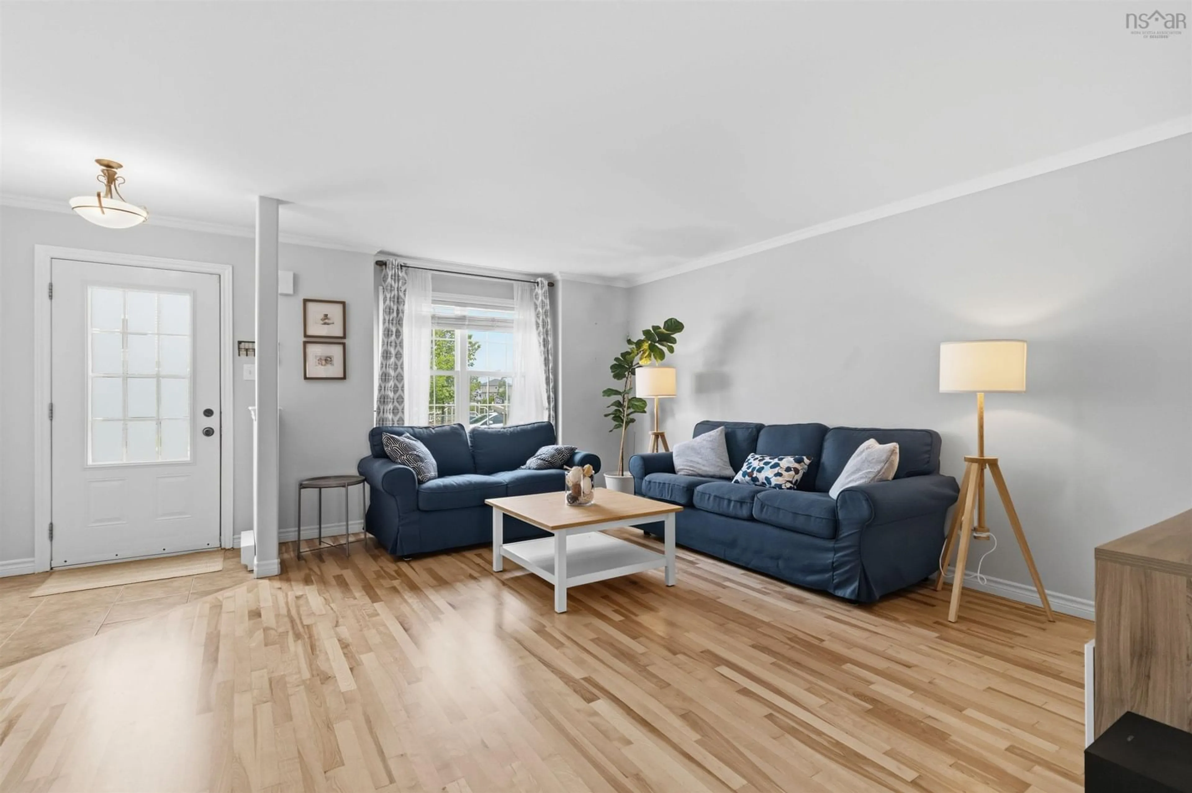 Living room with furniture, wood/laminate floor for 202 Transom Dr, Halifax Nova Scotia B3M 4T7