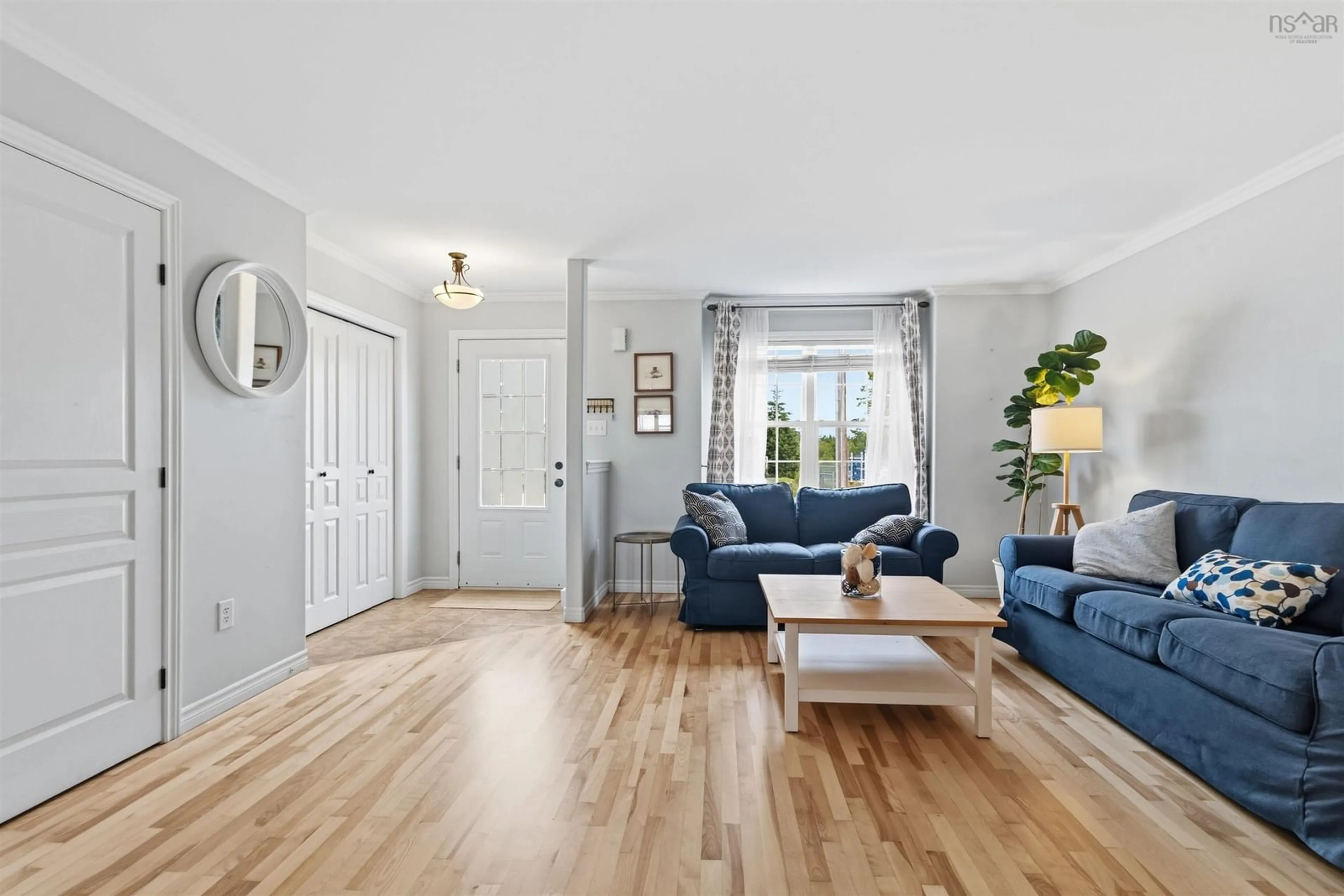 Living room with furniture, wood/laminate floor for 202 Transom Dr, Halifax Nova Scotia B3M 4T7