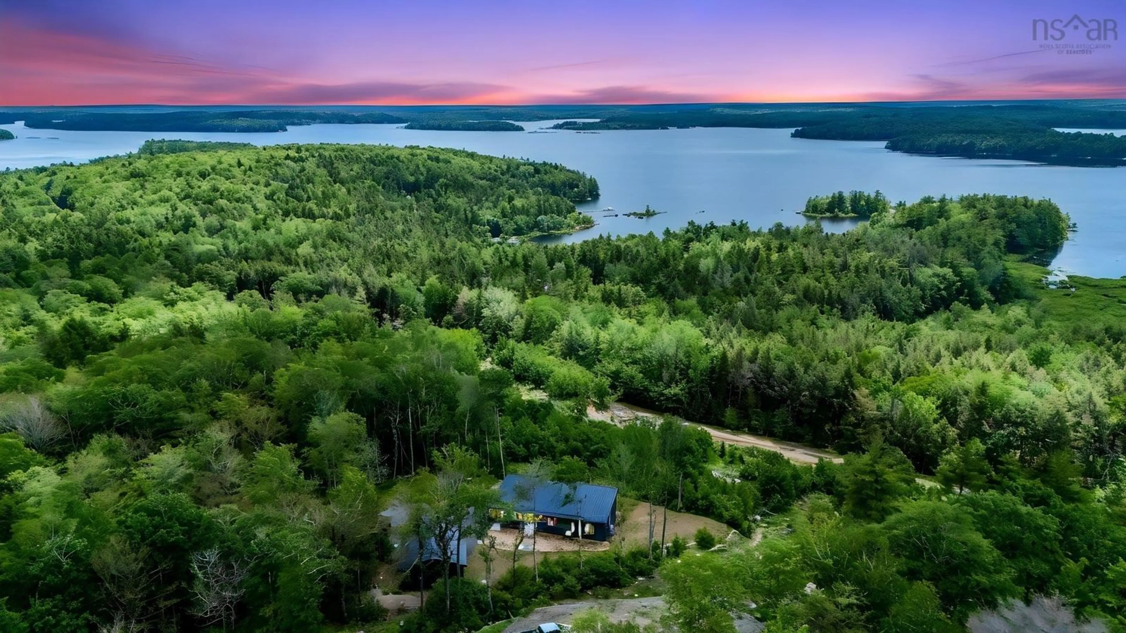 A pic from outside/outdoor area/front of a property/back of a property/a pic from drone, water/lake/river/ocean view for 67 Uhlman Point Road, Molega North Nova Scotia B0T 1X0