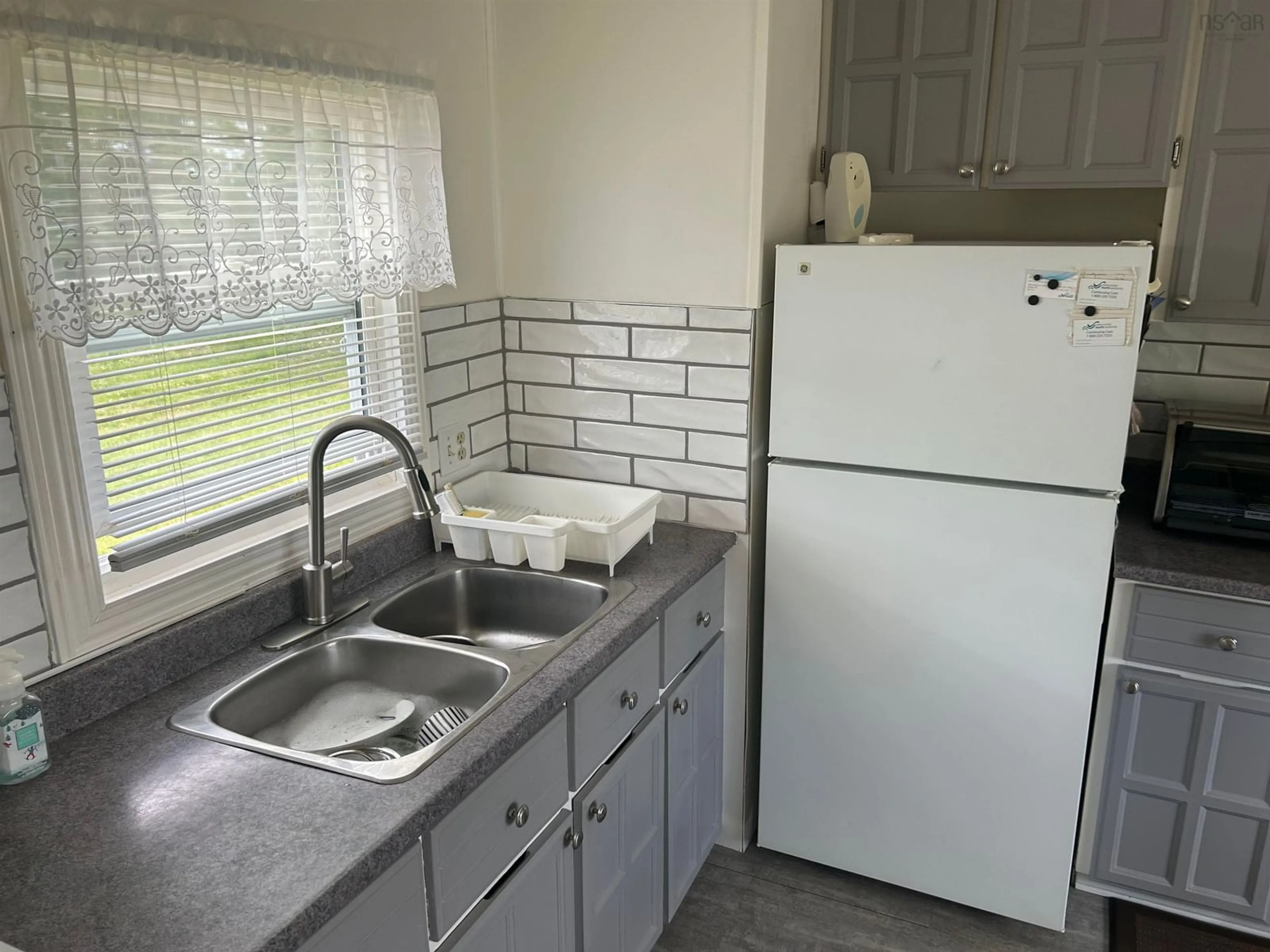 Standard kitchen, ceramic/tile floor for 128 Second St, Howie Centre Nova Scotia B1L 1C9
