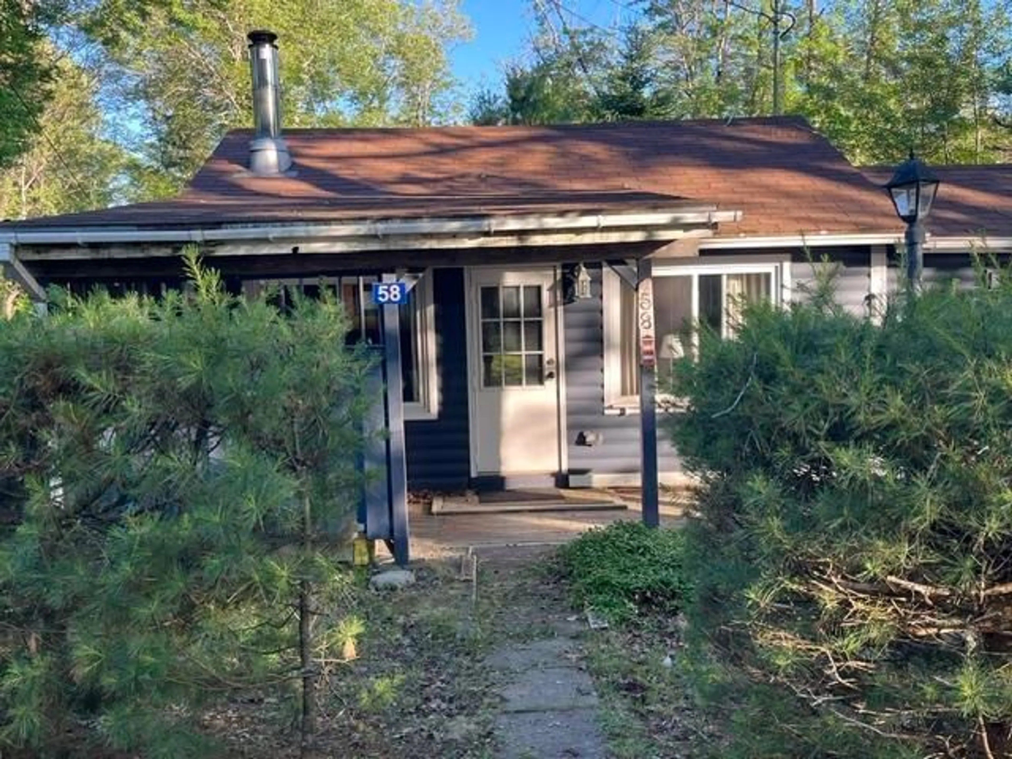 A pic from outside/outdoor area/front of a property/back of a property/a pic from drone, unknown for 58 Sandy Point Road, West Springhill Nova Scotia B0S 1A0