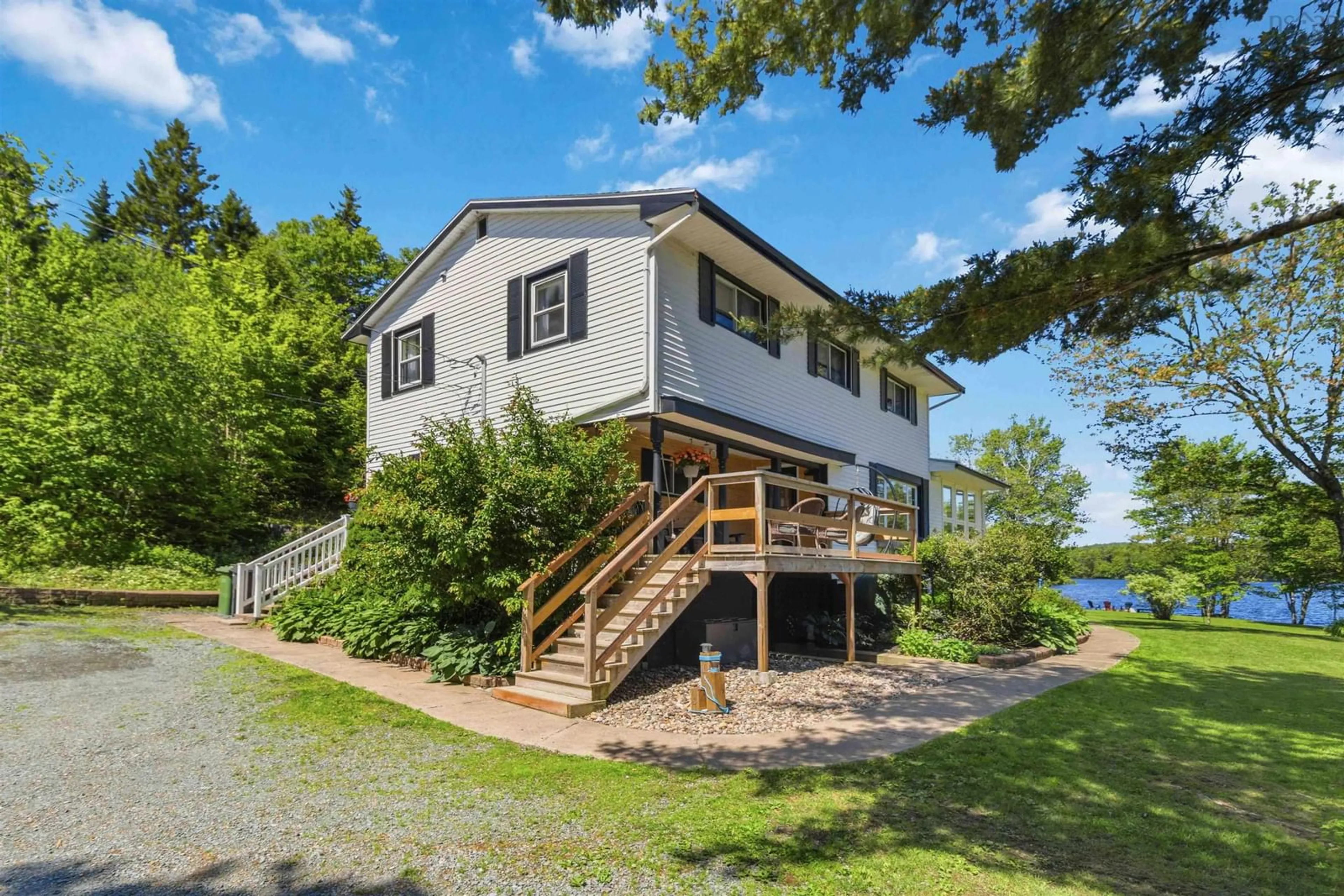 A pic from outside/outdoor area/front of a property/back of a property/a pic from drone, water/lake/river/ocean view for 20 Kings Way, Lake Echo Nova Scotia B3E 1N1