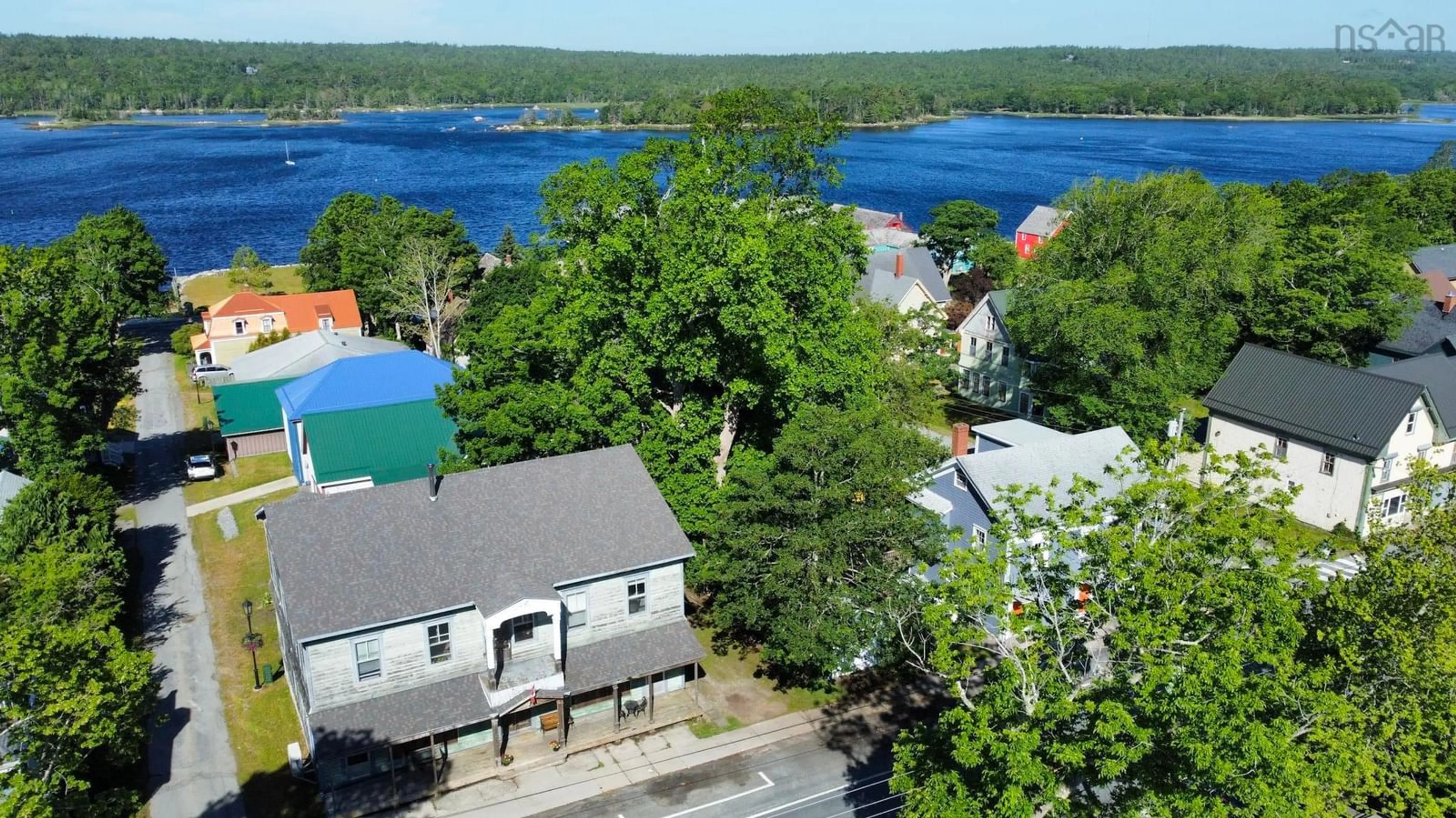 A pic from outside/outdoor area/front of a property/back of a property/a pic from drone, water/lake/river/ocean view for 121 Water St, Shelburne Nova Scotia B0T 1W0