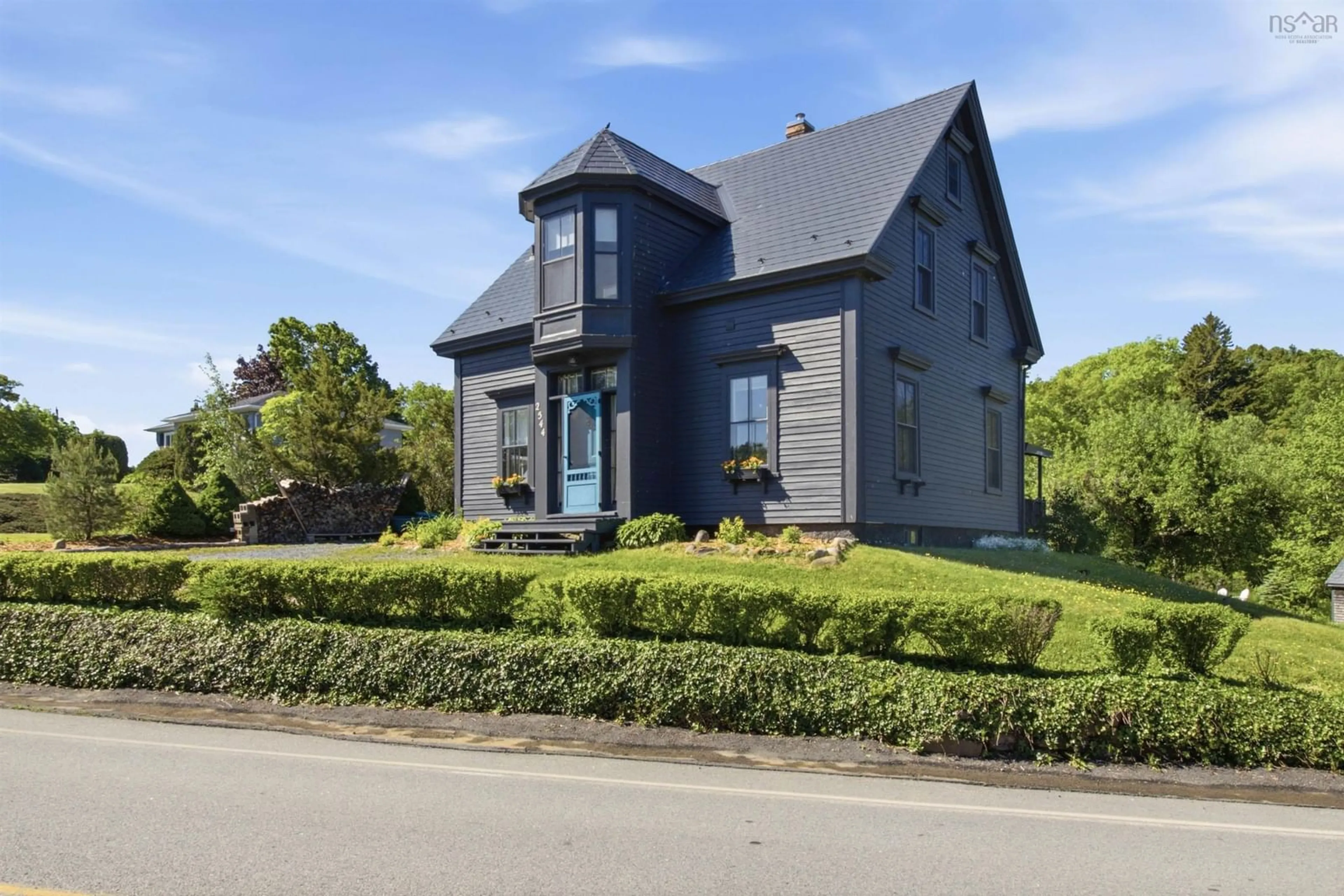 Home with brick exterior material, street for 2544 Highway 332, Bayport Nova Scotia B0J 2X0