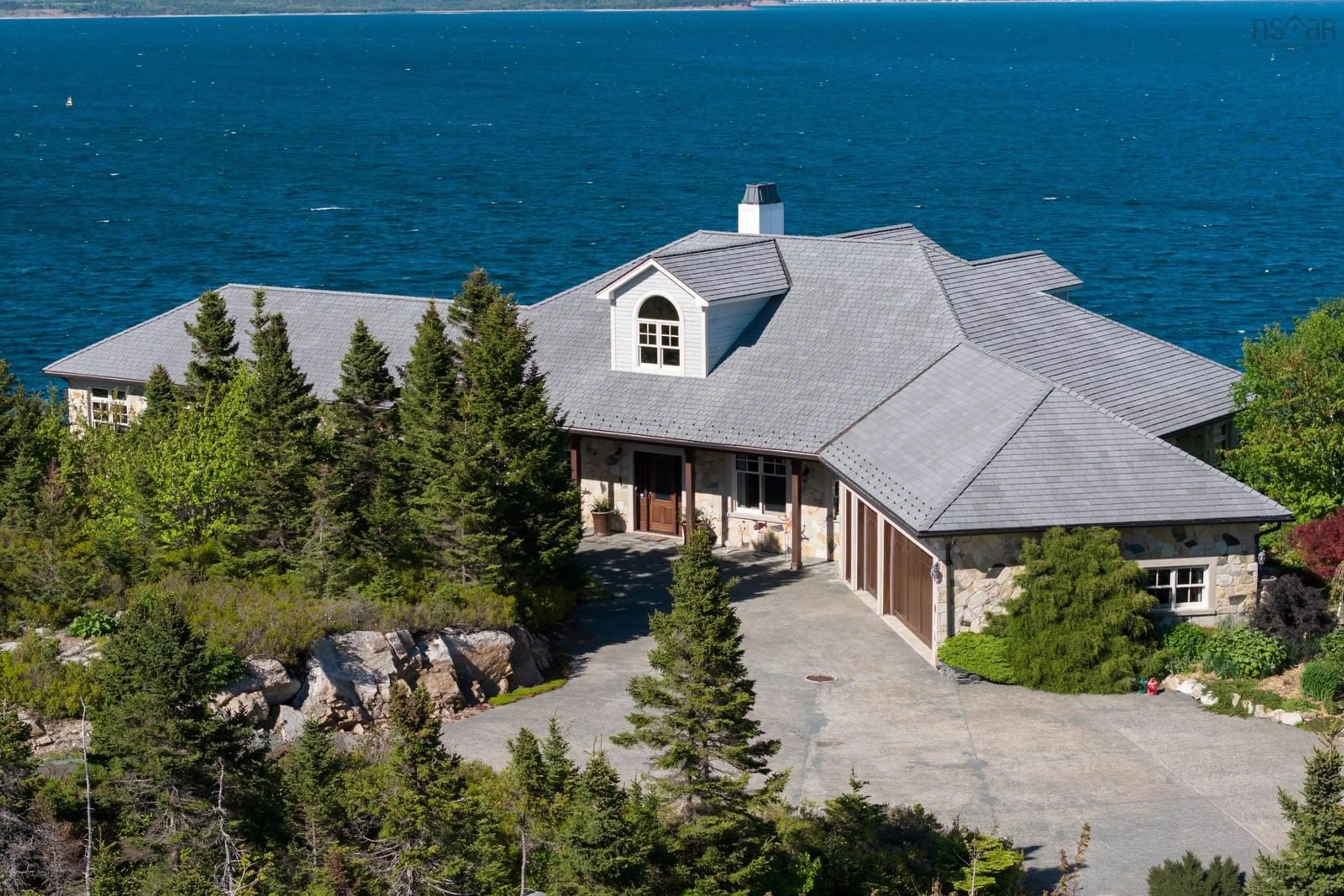 A pic from outside/outdoor area/front of a property/back of a property/a pic from drone, water/lake/river/ocean view for 388 Ketch Harbour Rd, Halibut Bay Nova Scotia B3V 1P6