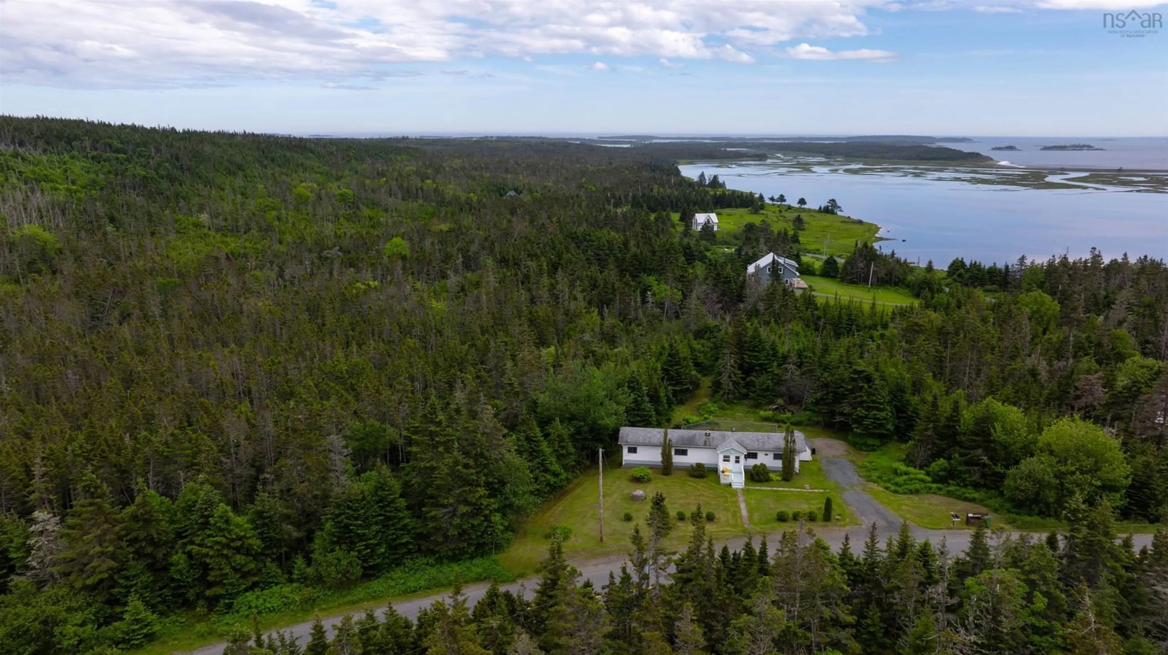 A pic from outside/outdoor area/front of a property/back of a property/a pic from drone, water/lake/river/ocean view for 3267 Clam Harbour Rd, Clam Harbour Nova Scotia B0J 1Y0