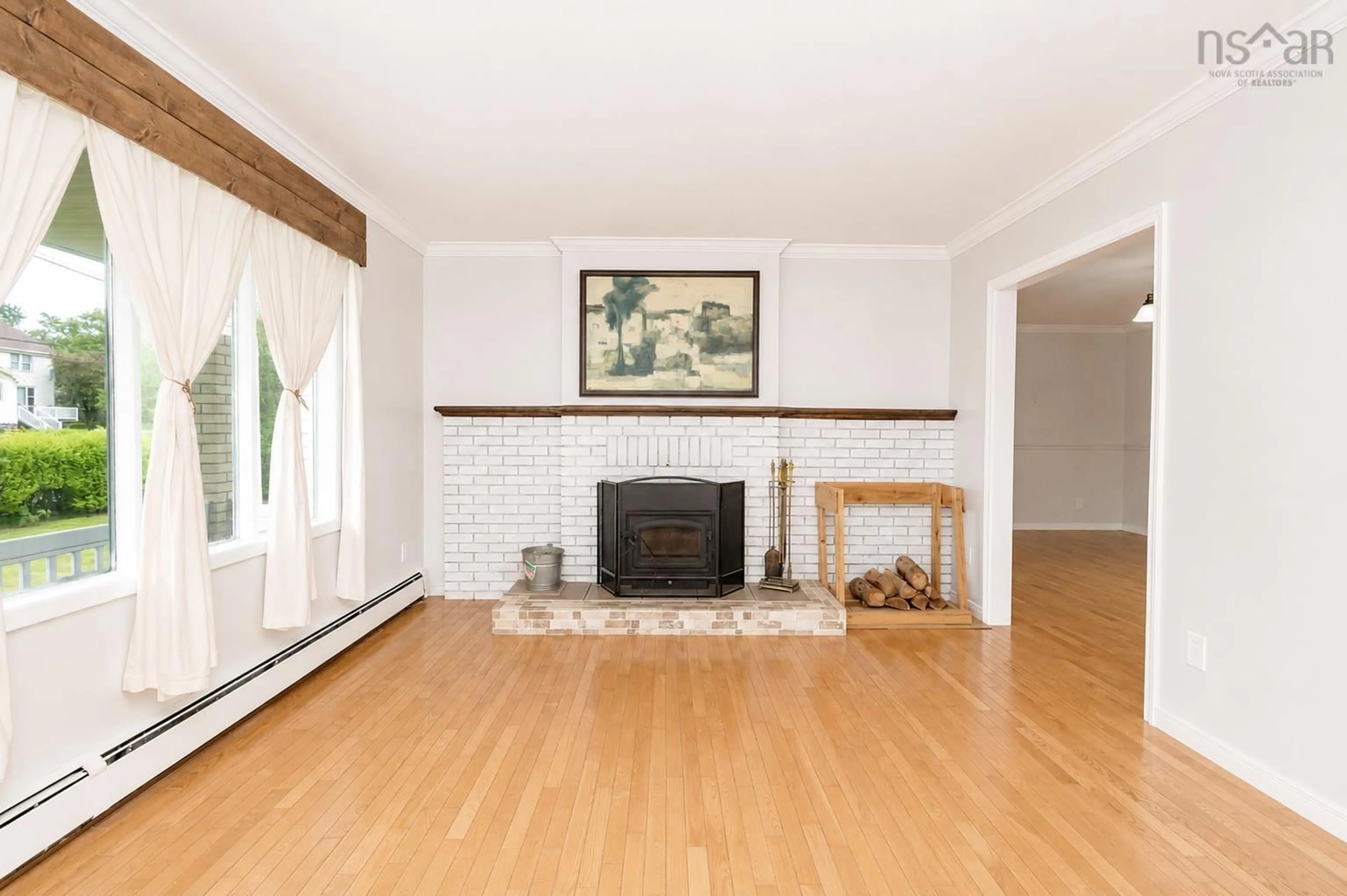 Living room with furniture, wood/laminate floor for 112 South St, Glace Bay Nova Scotia B1A 1V6