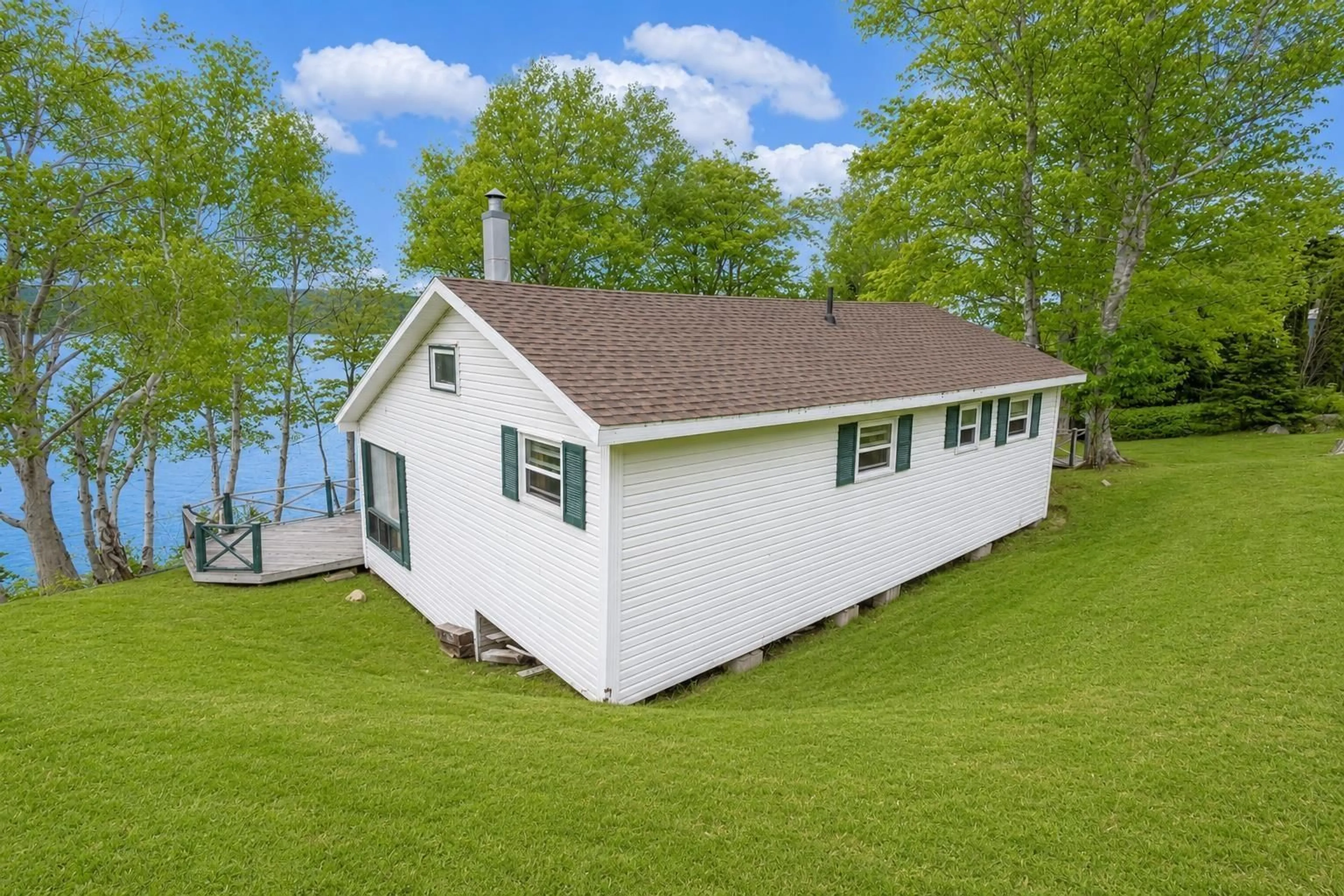 A pic from outside/outdoor area/front of a property/back of a property/a pic from drone, water/lake/river/ocean view for 5636 East Bay Hwy, Ben Eoin Nova Scotia B0E 3B0