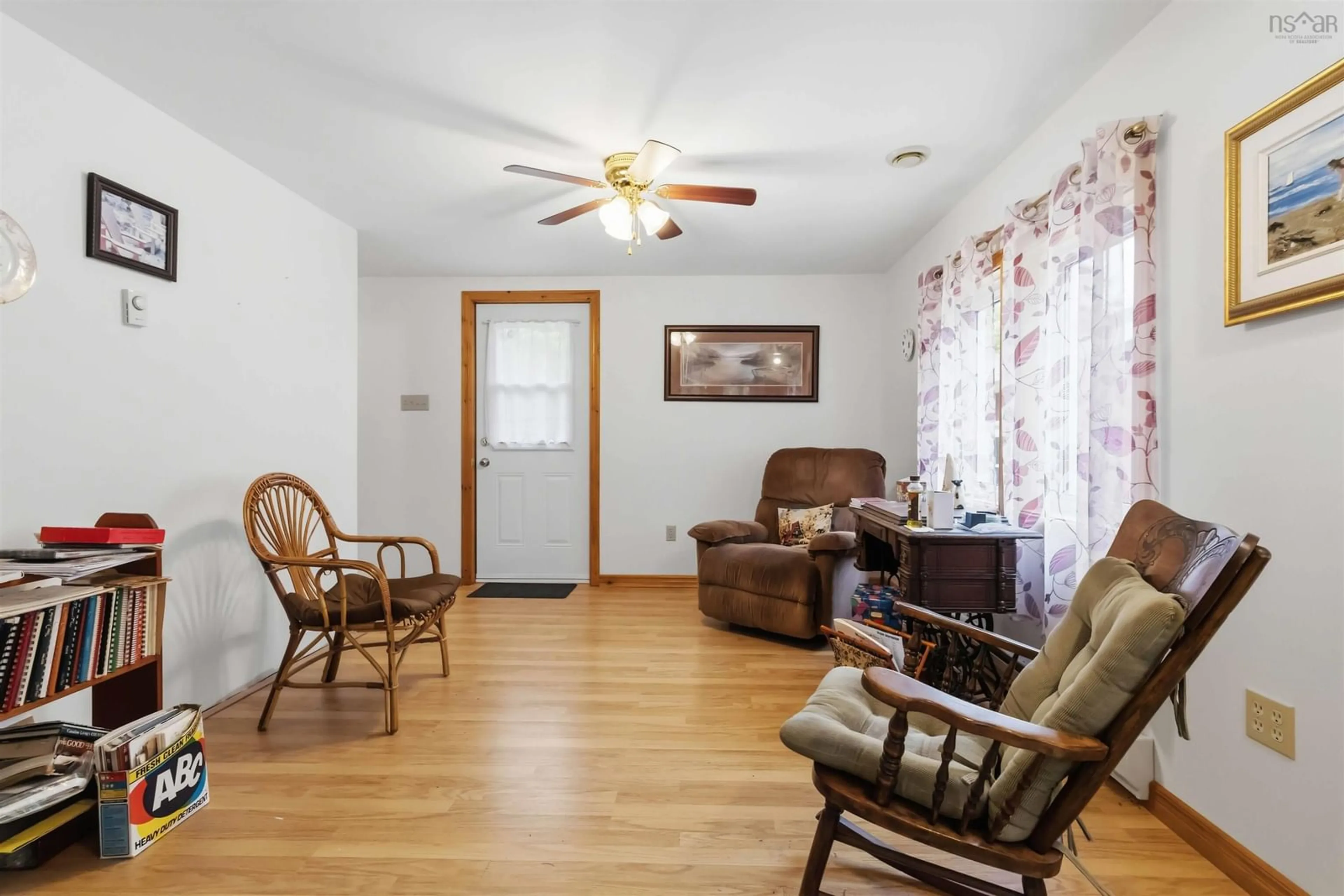 Living room with furniture, wood/laminate floor for 623 Forties Rd, New Ross Nova Scotia B0J 2M0