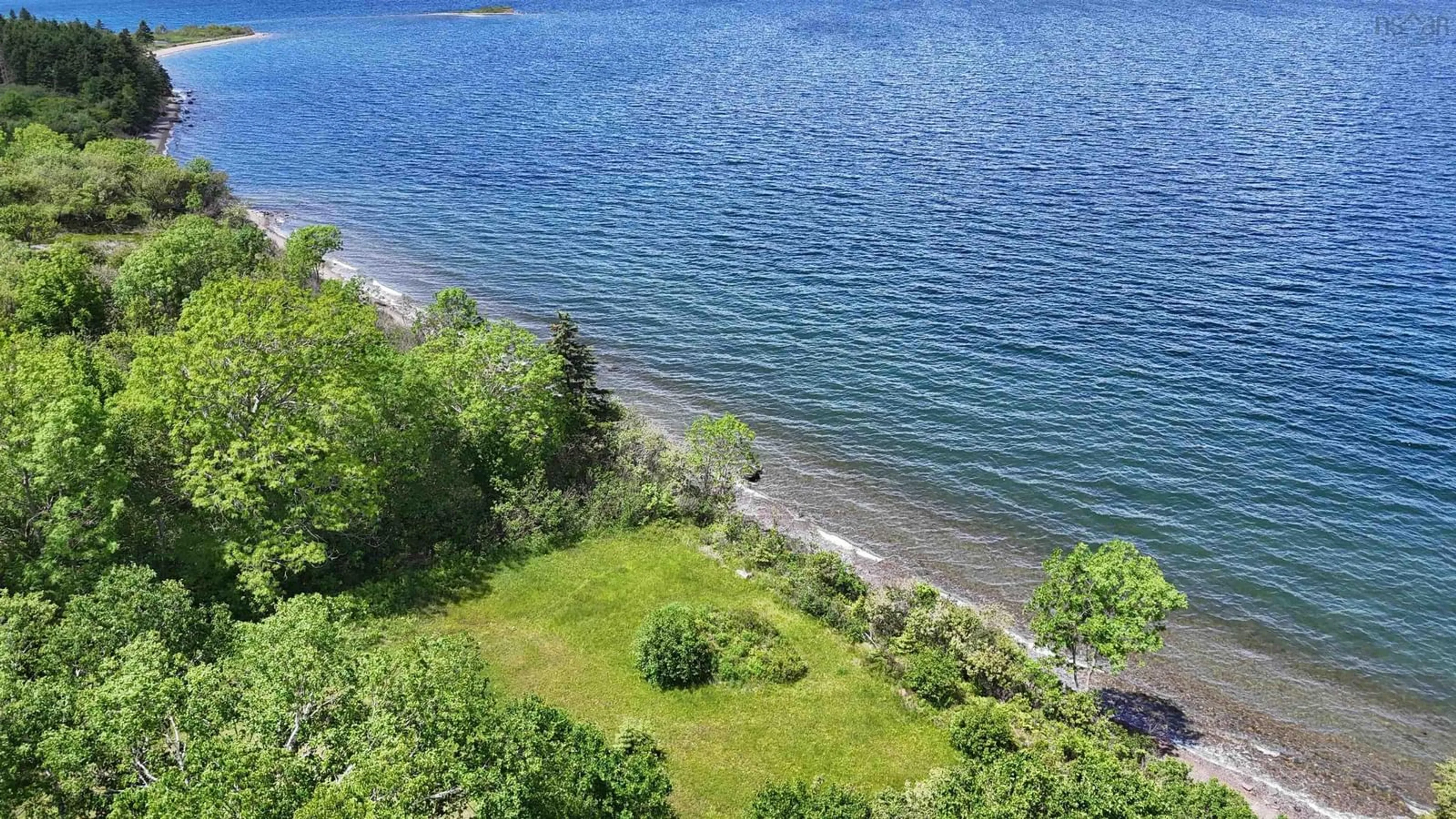 A pic from outside/outdoor area/front of a property/back of a property/a pic from drone, water/lake/river/ocean view for 3653 West Bay Road, St. Georges Channel Nova Scotia B0E 3K0