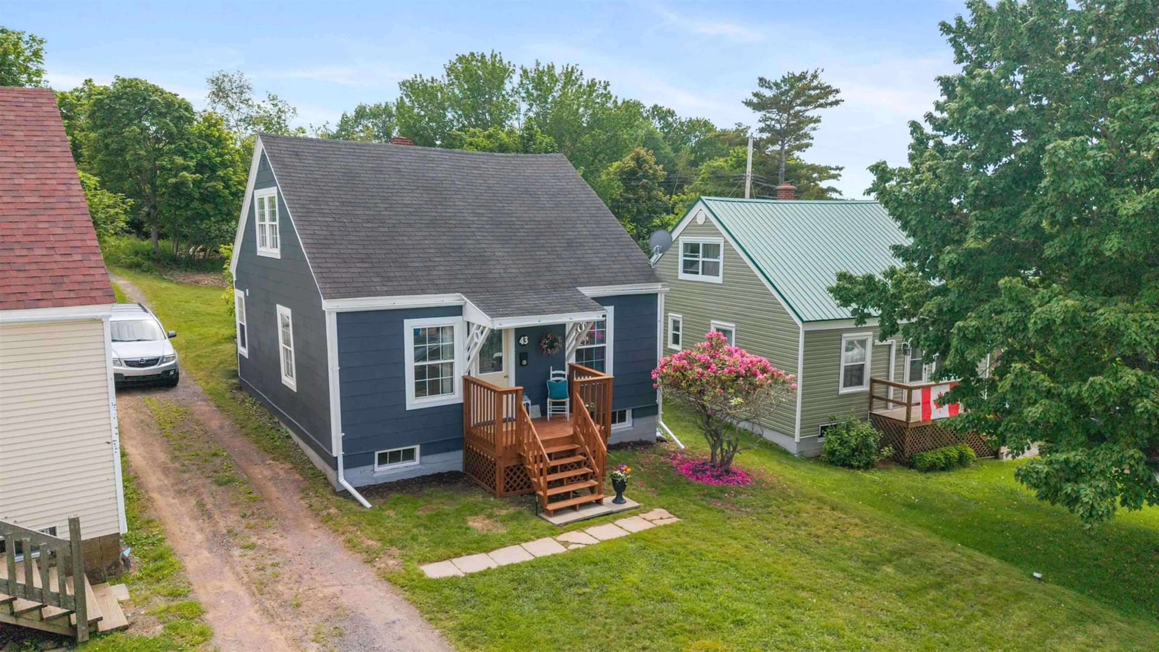 A pic from outside/outdoor area/front of a property/back of a property/a pic from drone, street for 43 Highland Dr, New Glasgow Nova Scotia B2H 4C3