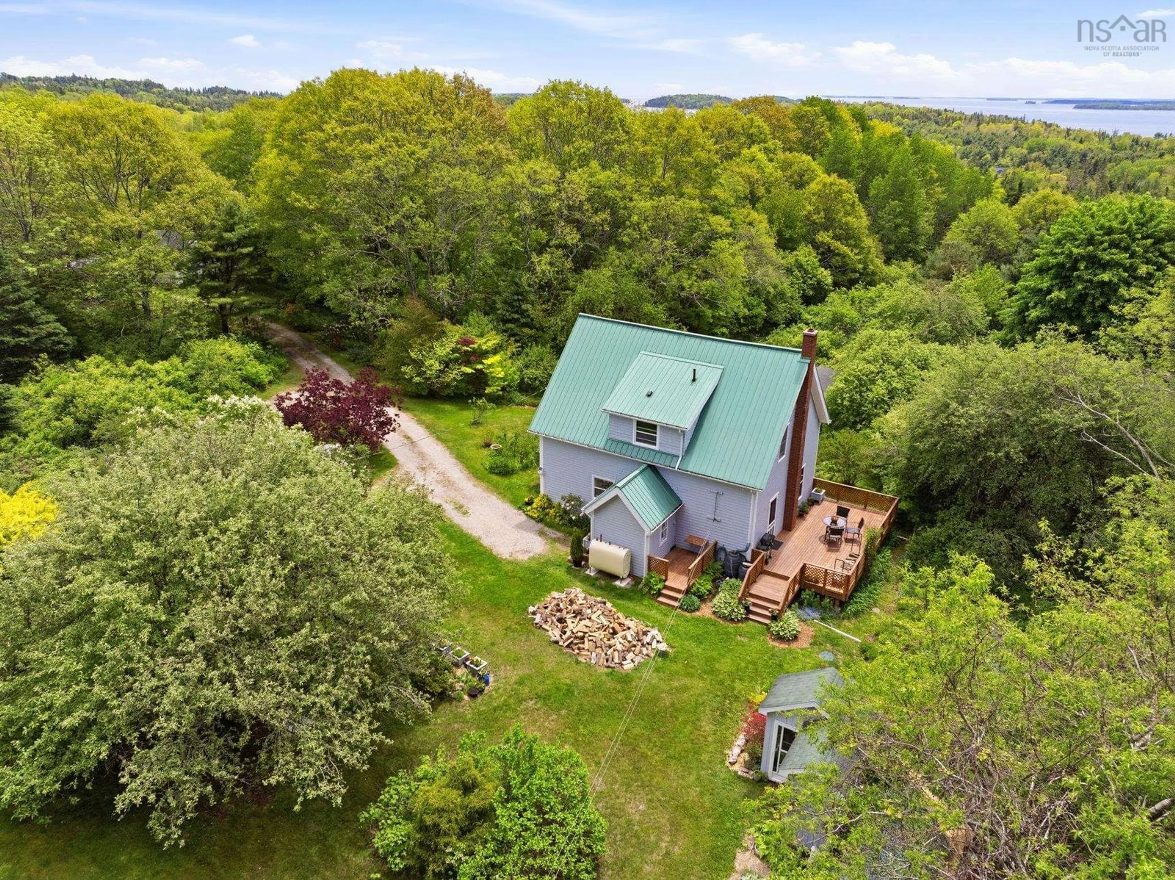 A pic from outside/outdoor area/front of a property/back of a property/a pic from drone, unknown for 47 Wake Up Hill Rd, Marriott's Cove Nova Scotia B0J 1K0