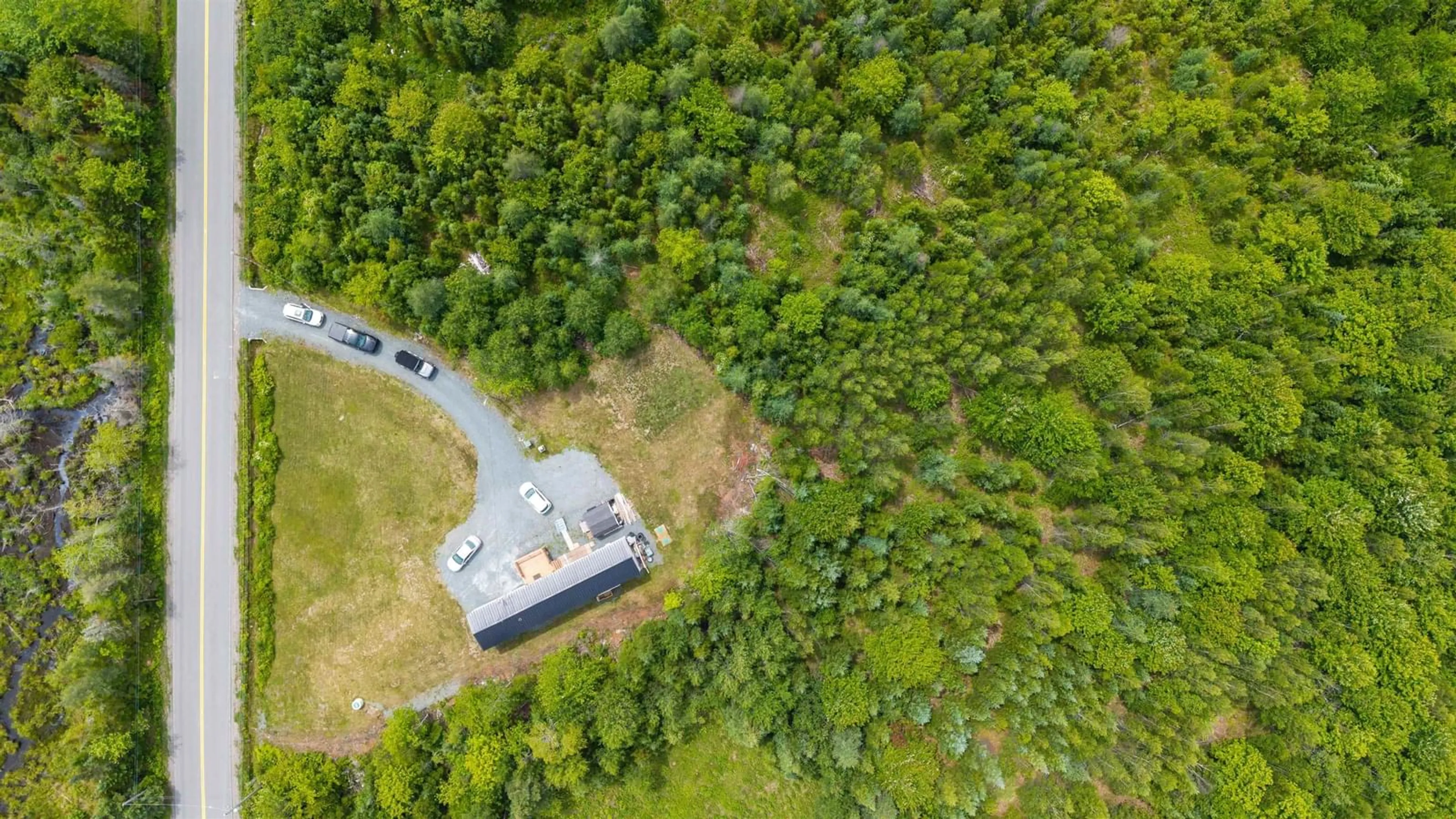 A pic from outside/outdoor area/front of a property/back of a property/a pic from drone, forest/trees view for 271 Glenmore Rd, Glenmore Nova Scotia B0N 1X0