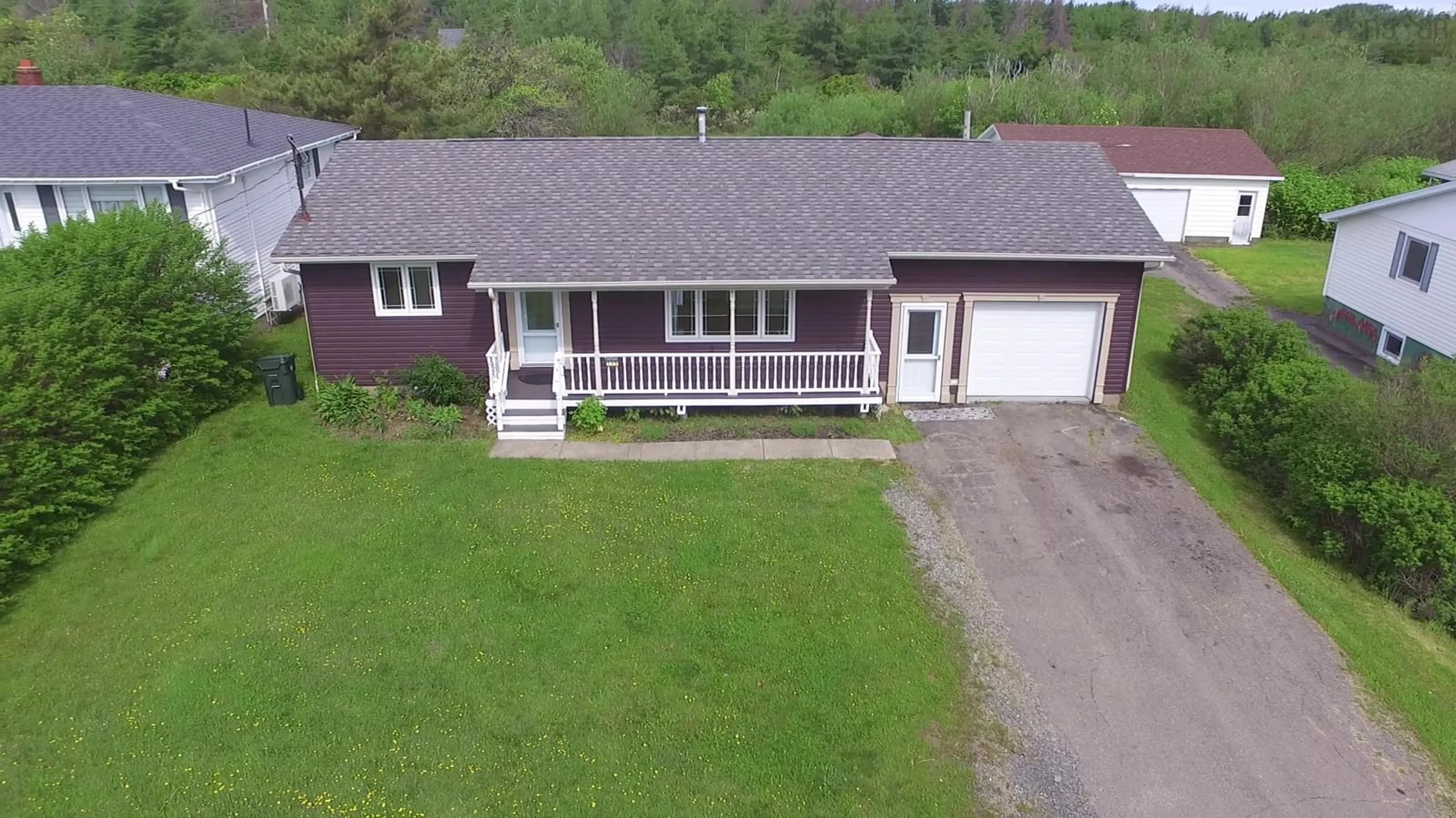 A pic from outside/outdoor area/front of a property/back of a property/a pic from drone, unknown for 115 Main St, Reserve Mines Nova Scotia B1E 1E7
