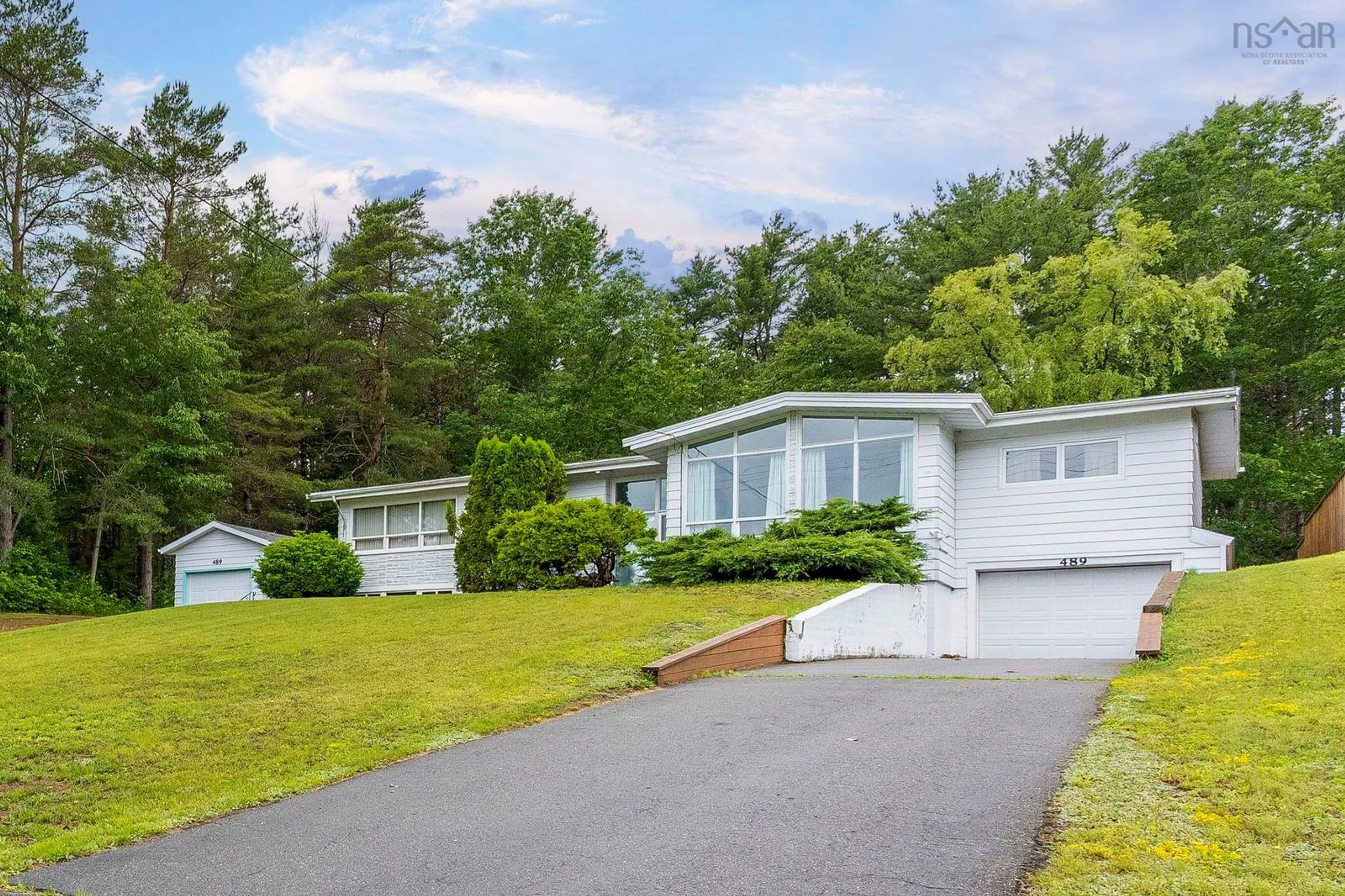 Home with vinyl exterior material, street for 489 Pine Ridge Avenue, Kingston Nova Scotia B0P 1R0
