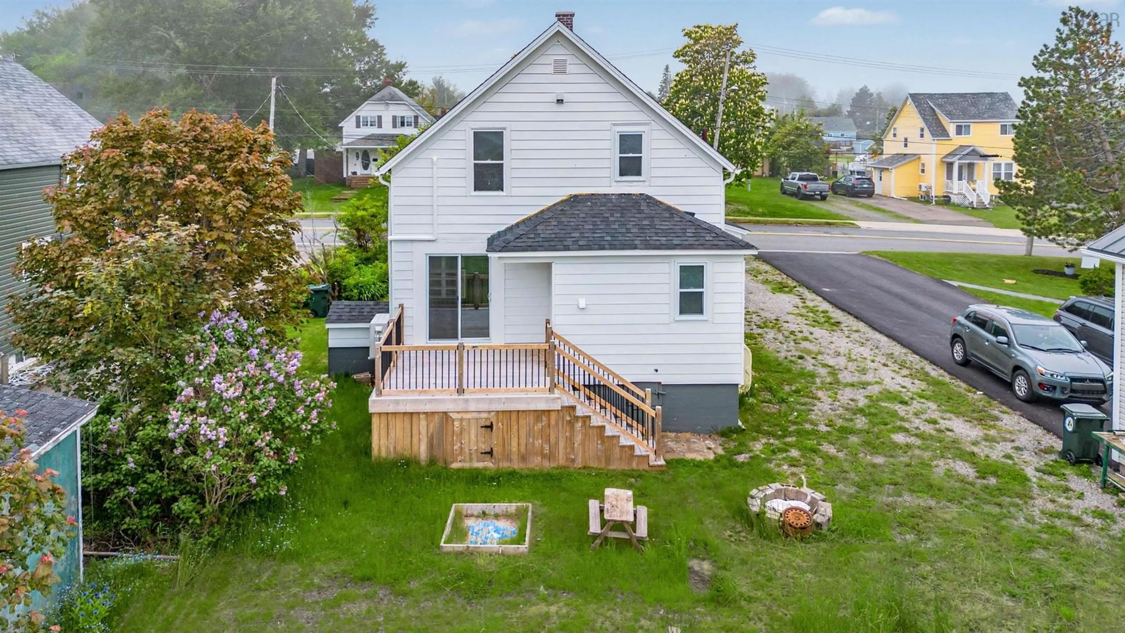 A pic from outside/outdoor area/front of a property/back of a property/a pic from drone, unknown for 3481 Ellsworth Ave, New Waterford Nova Scotia B1H 2G4