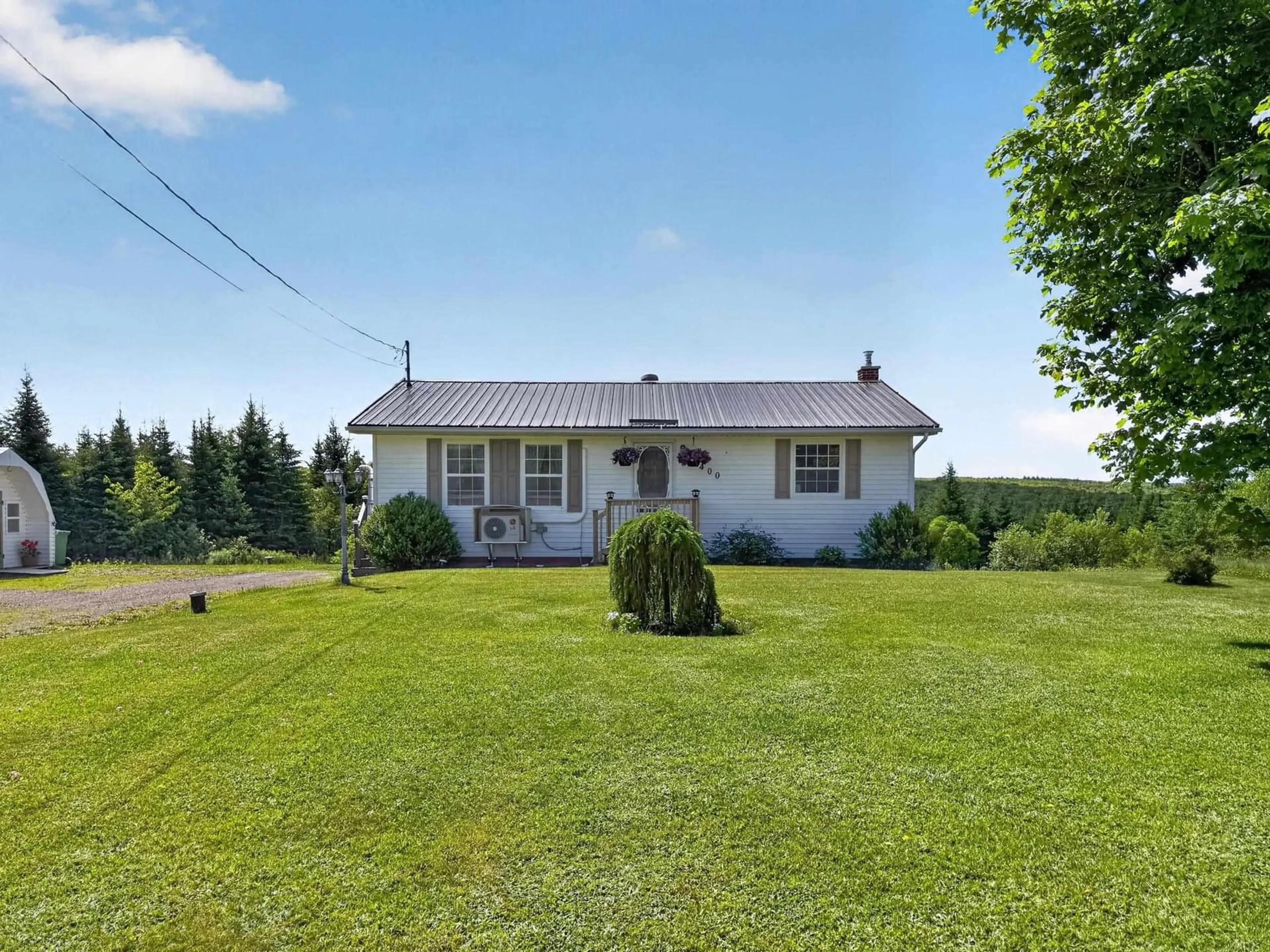 A pic from outside/outdoor area/front of a property/back of a property/a pic from drone, unknown for 4400 Highway 311, Nuttby Nova Scotia B6L 6J2