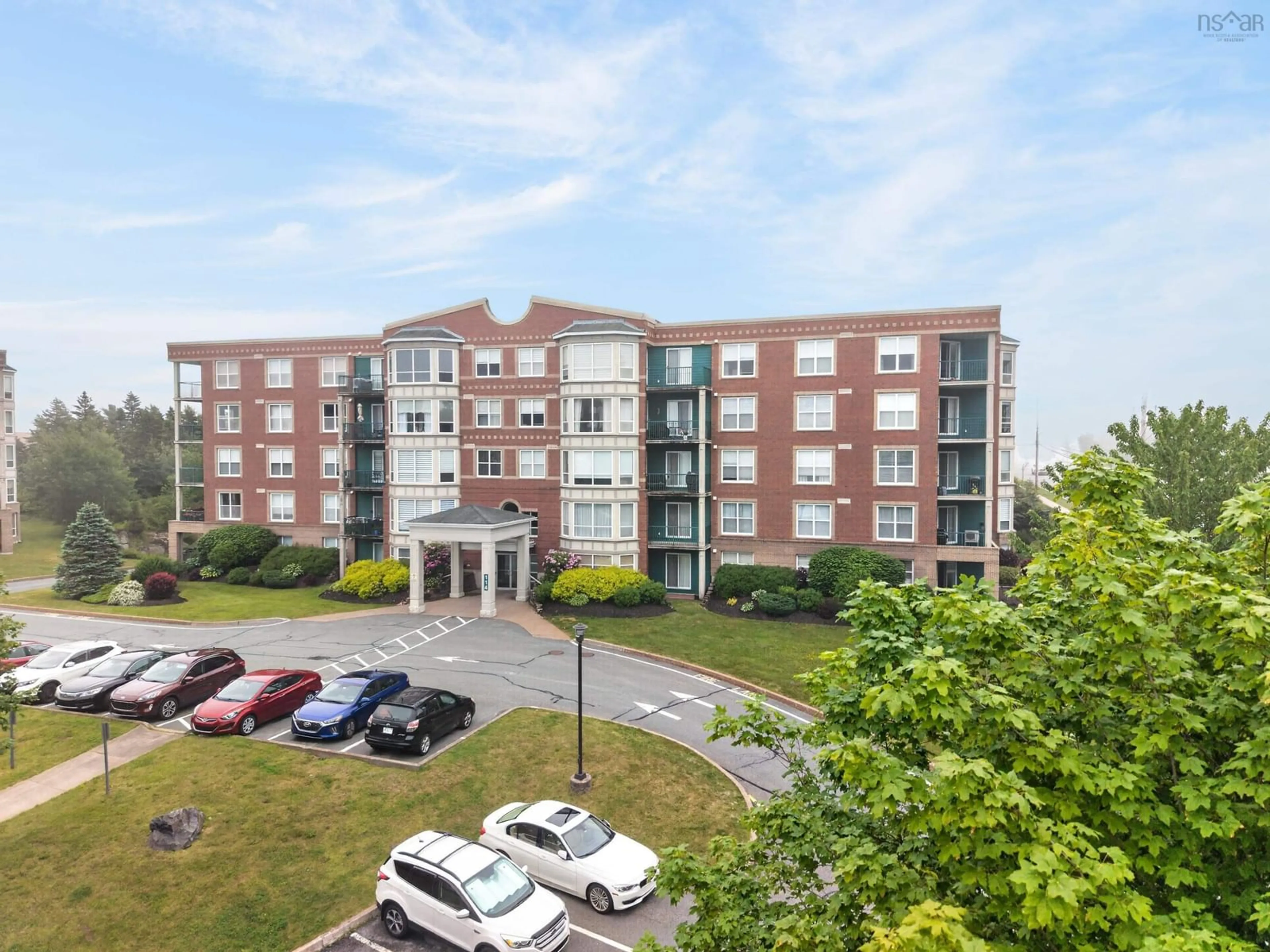 A pic from outside/outdoor area/front of a property/back of a property/a pic from drone, building for 114 Regency Park Dr #304, Halifax Nova Scotia B3S 1R9