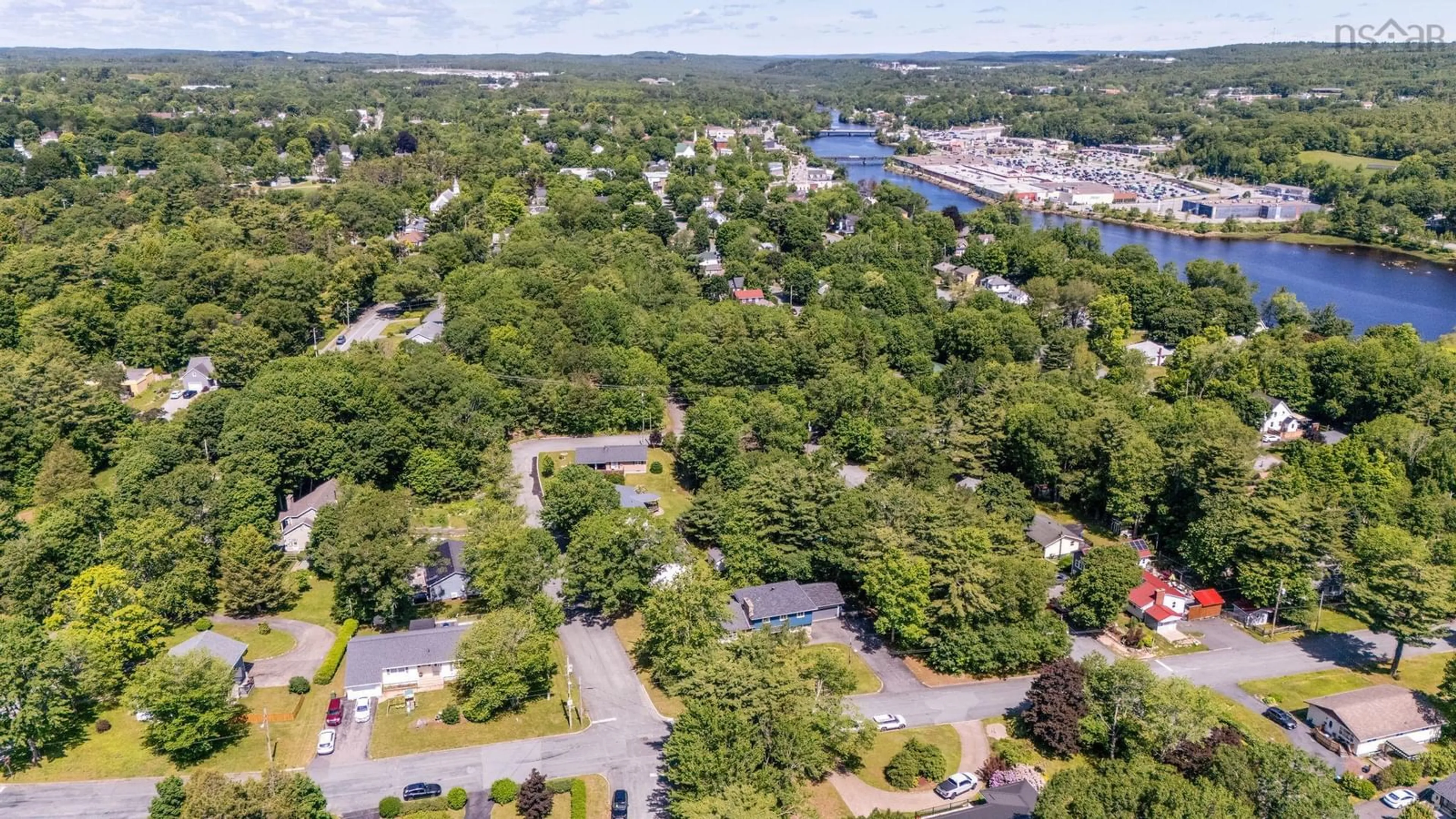 A pic from outside/outdoor area/front of a property/back of a property/a pic from drone, water/lake/river/ocean view for 36 Acadia St, Bridgewater Nova Scotia B4V 2B2