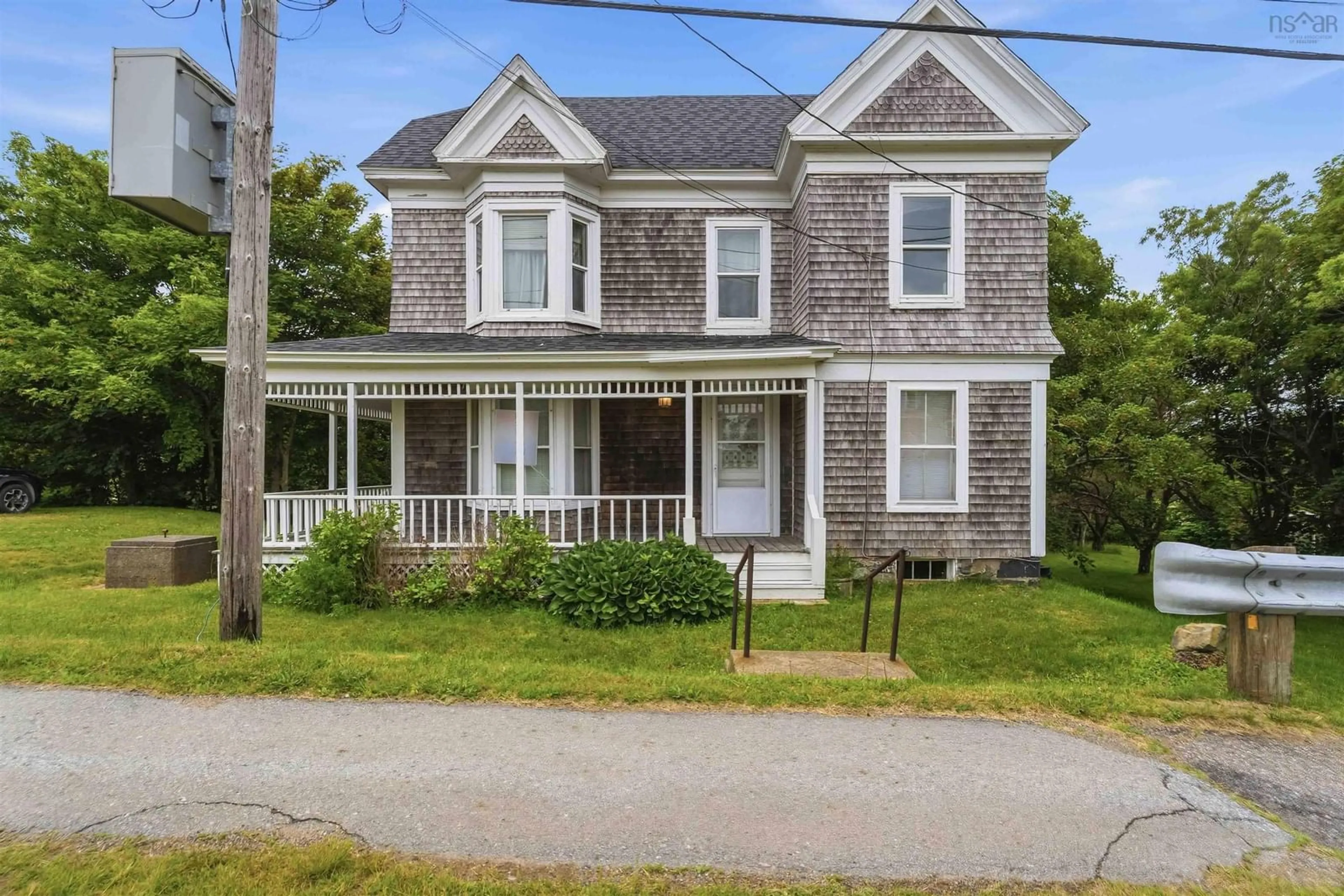Home with brick exterior material, street for 1843 Highway 1, Church Point Nova Scotia B0W 1M0