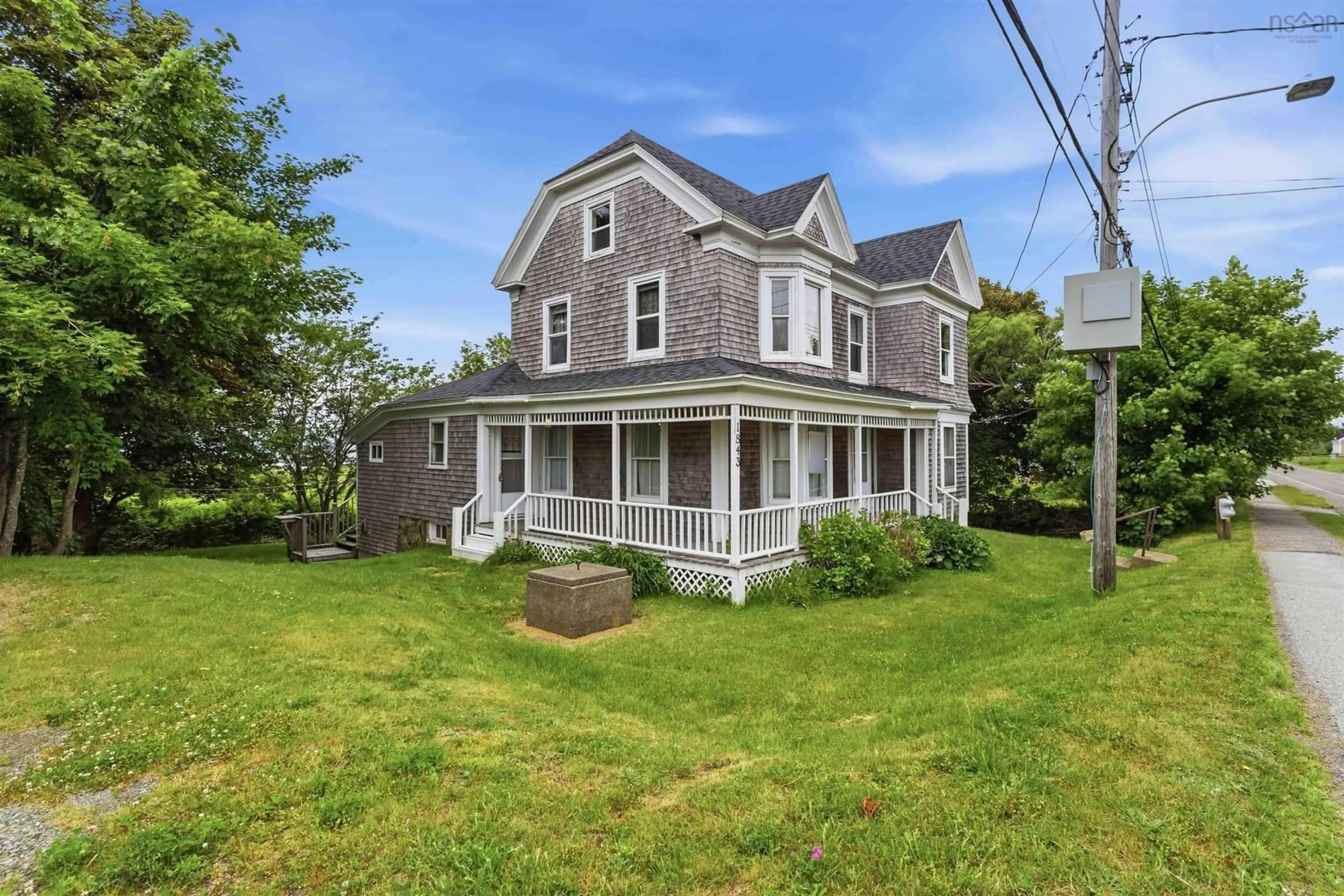 A pic from outside/outdoor area/front of a property/back of a property/a pic from drone, street for 1843 Highway 1, Church Point Nova Scotia B0W 1M0
