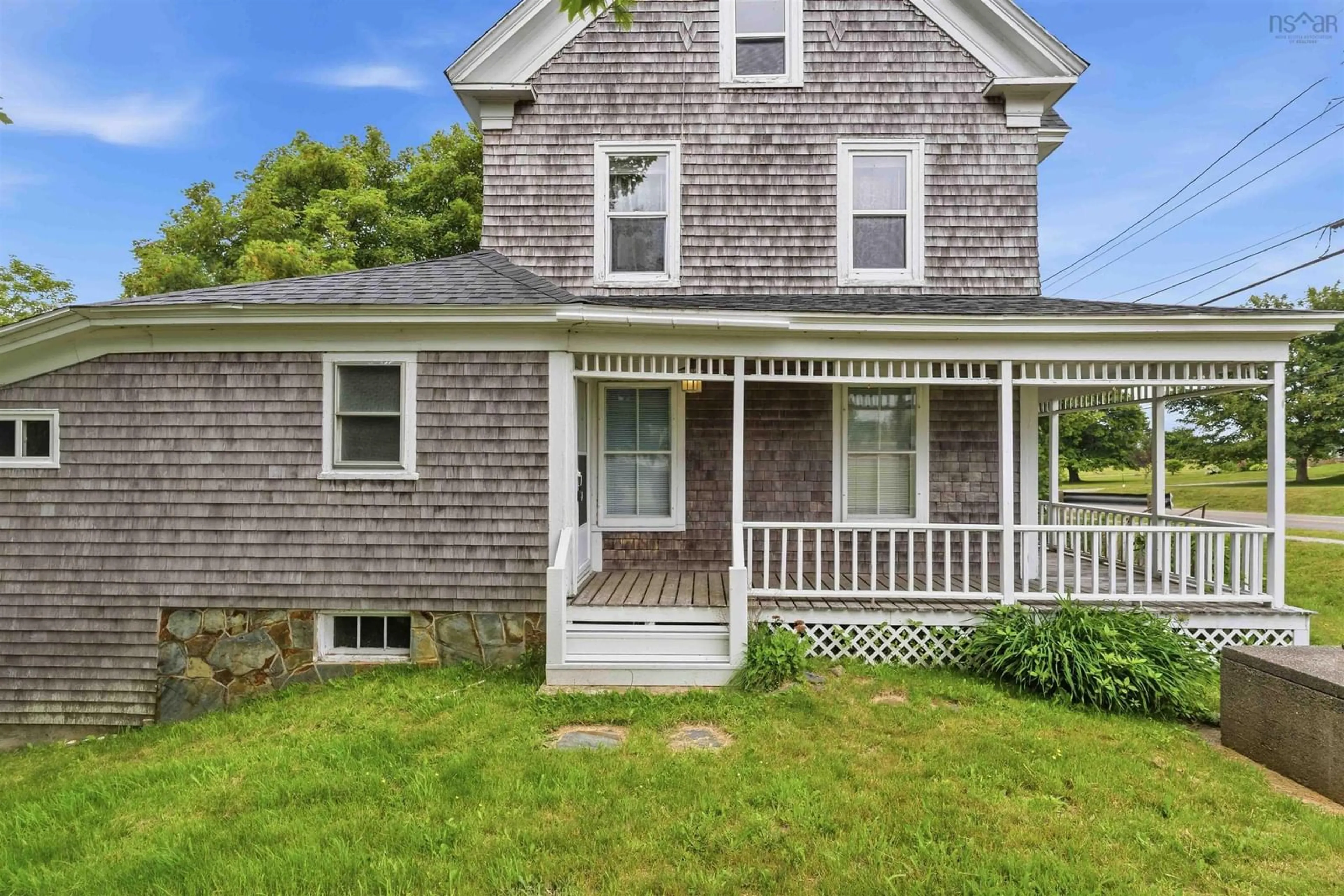 Home with vinyl exterior material, street for 1843 Highway 1, Church Point Nova Scotia B0W 1M0