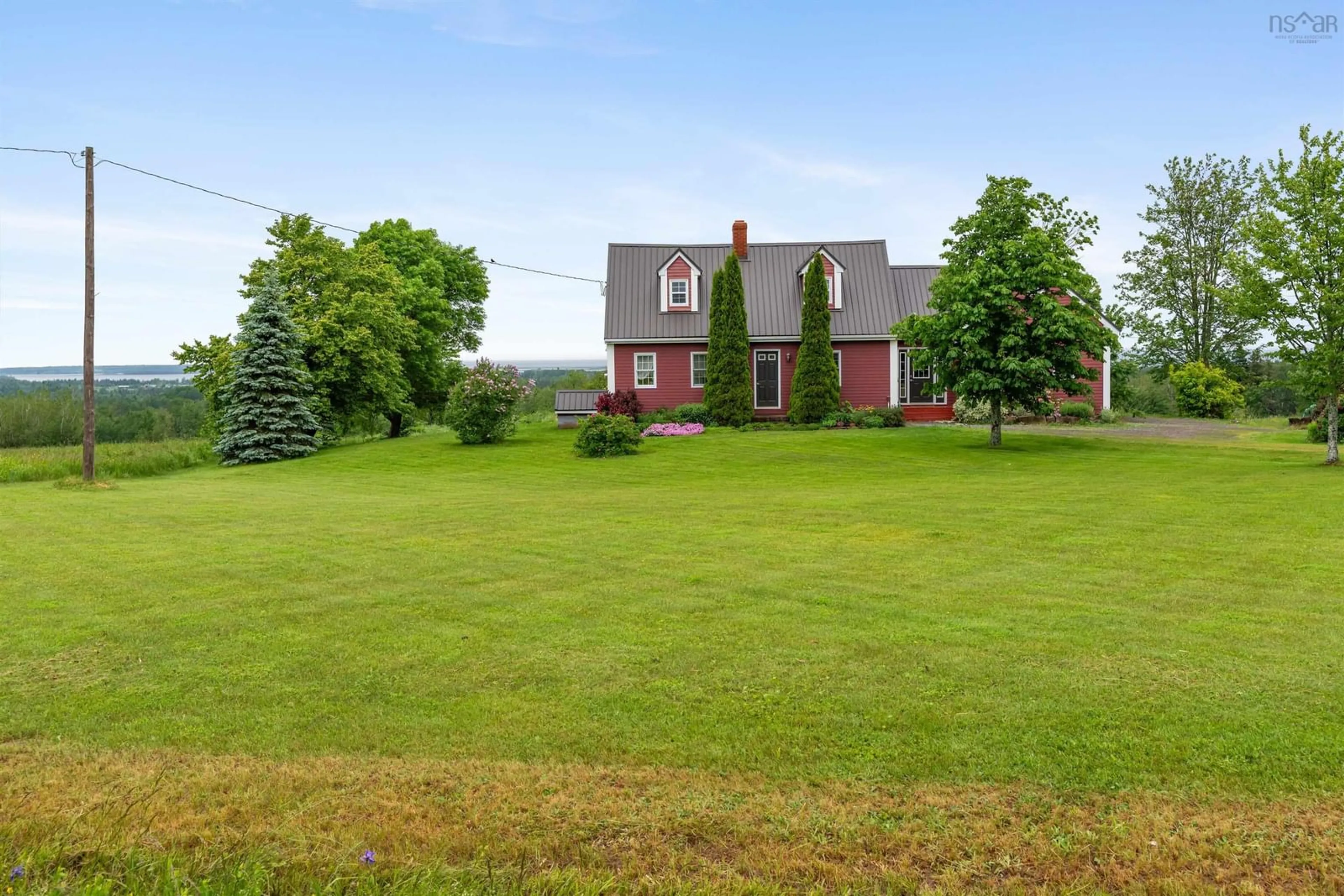 A pic from outside/outdoor area/front of a property/back of a property/a pic from drone, water/lake/river/ocean view for 199 Mcinnis Road Malagash, Malagash Nova Scotia B0K 1E0