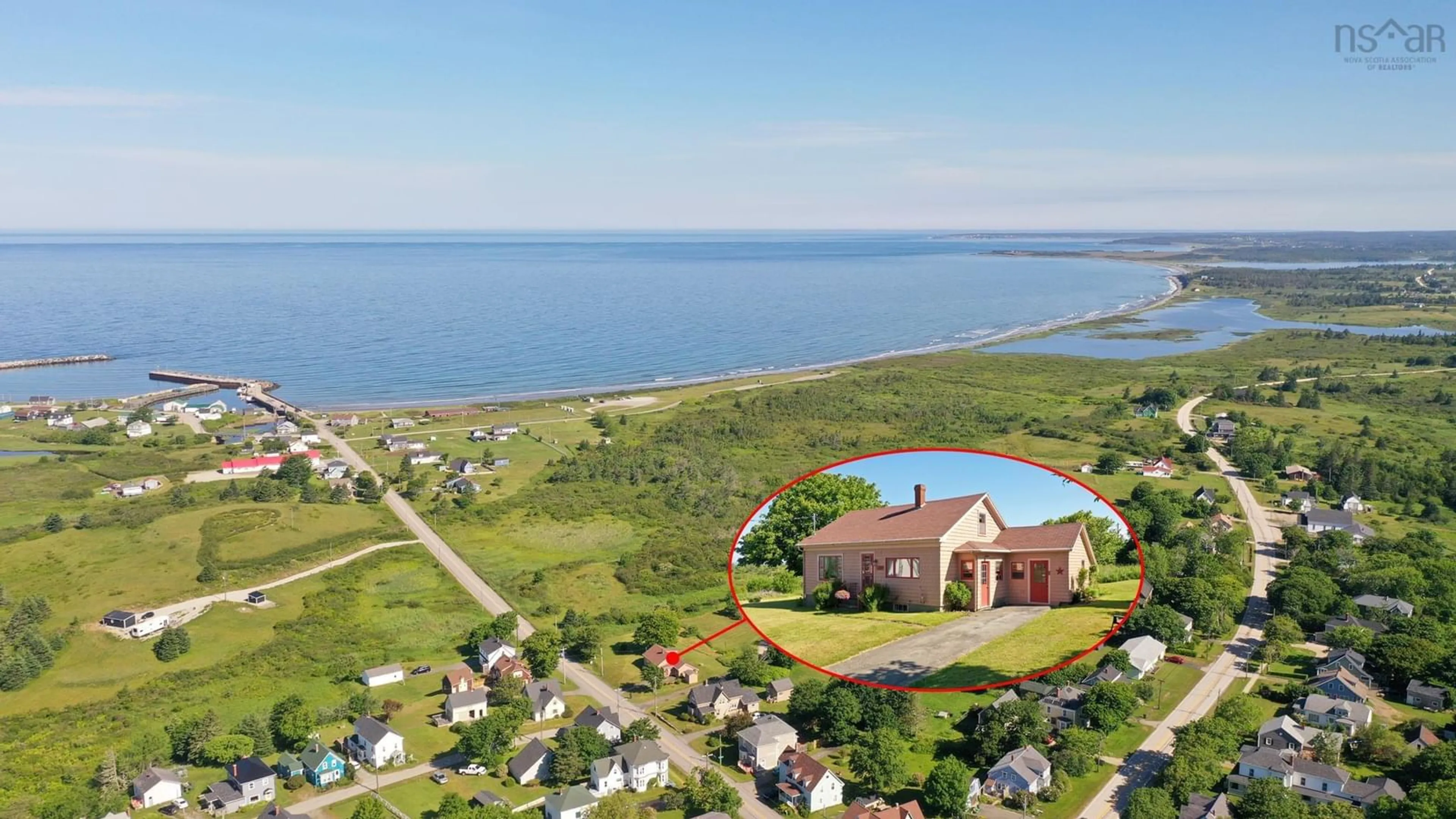 A pic from outside/outdoor area/front of a property/back of a property/a pic from drone, water/lake/river/ocean view for 3389 Main Shore Rd, Port Maitland Nova Scotia B5A 5V6