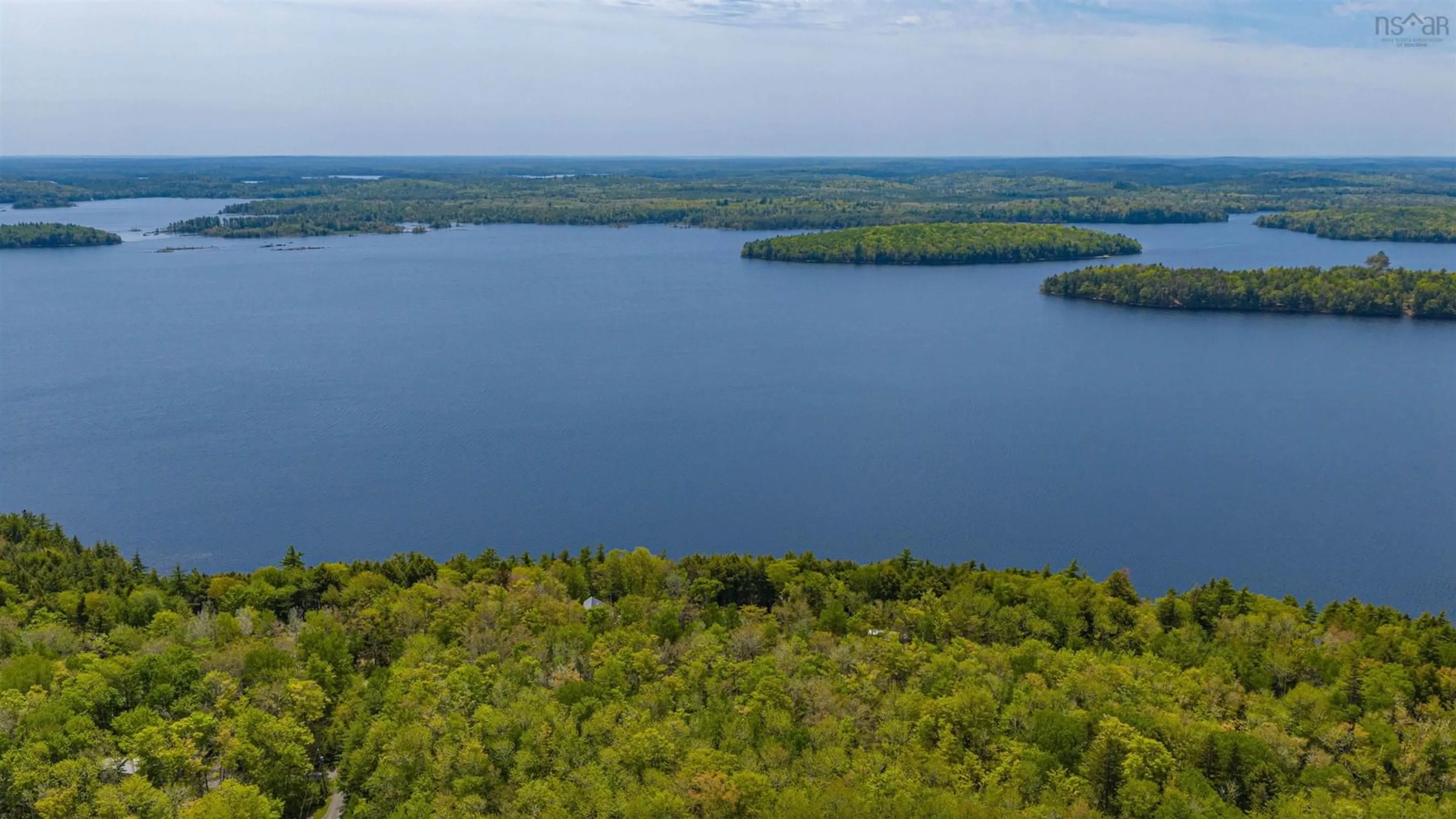 A pic from outside/outdoor area/front of a property/back of a property/a pic from drone, water/lake/river/ocean view for 265 High Point Terr, Molega Nova Scotia B0T 1X0